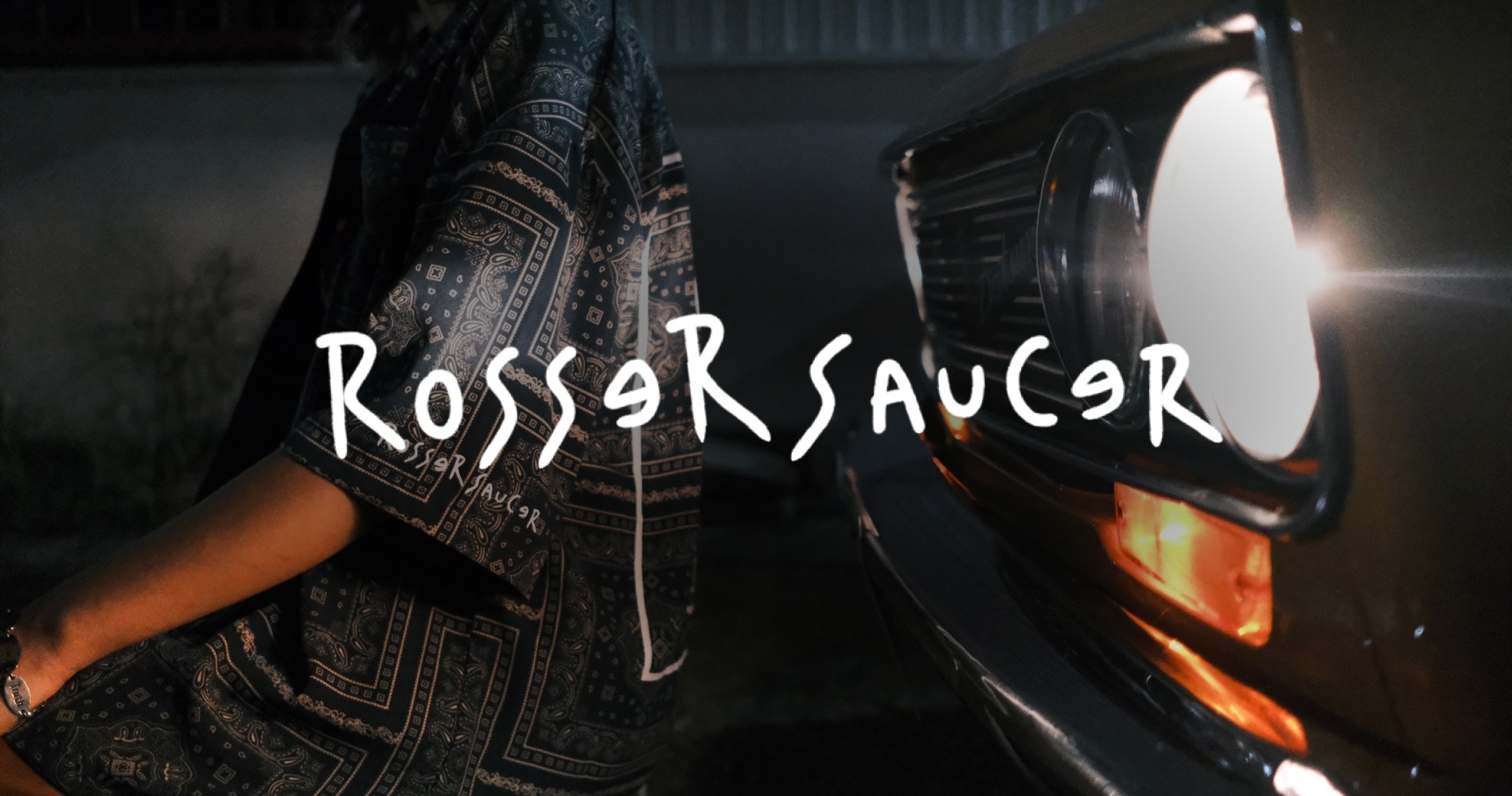 This dynamic image captures the motion of a vibrant yellow taxi as it moves swiftly through what seems to be an urban street at night.