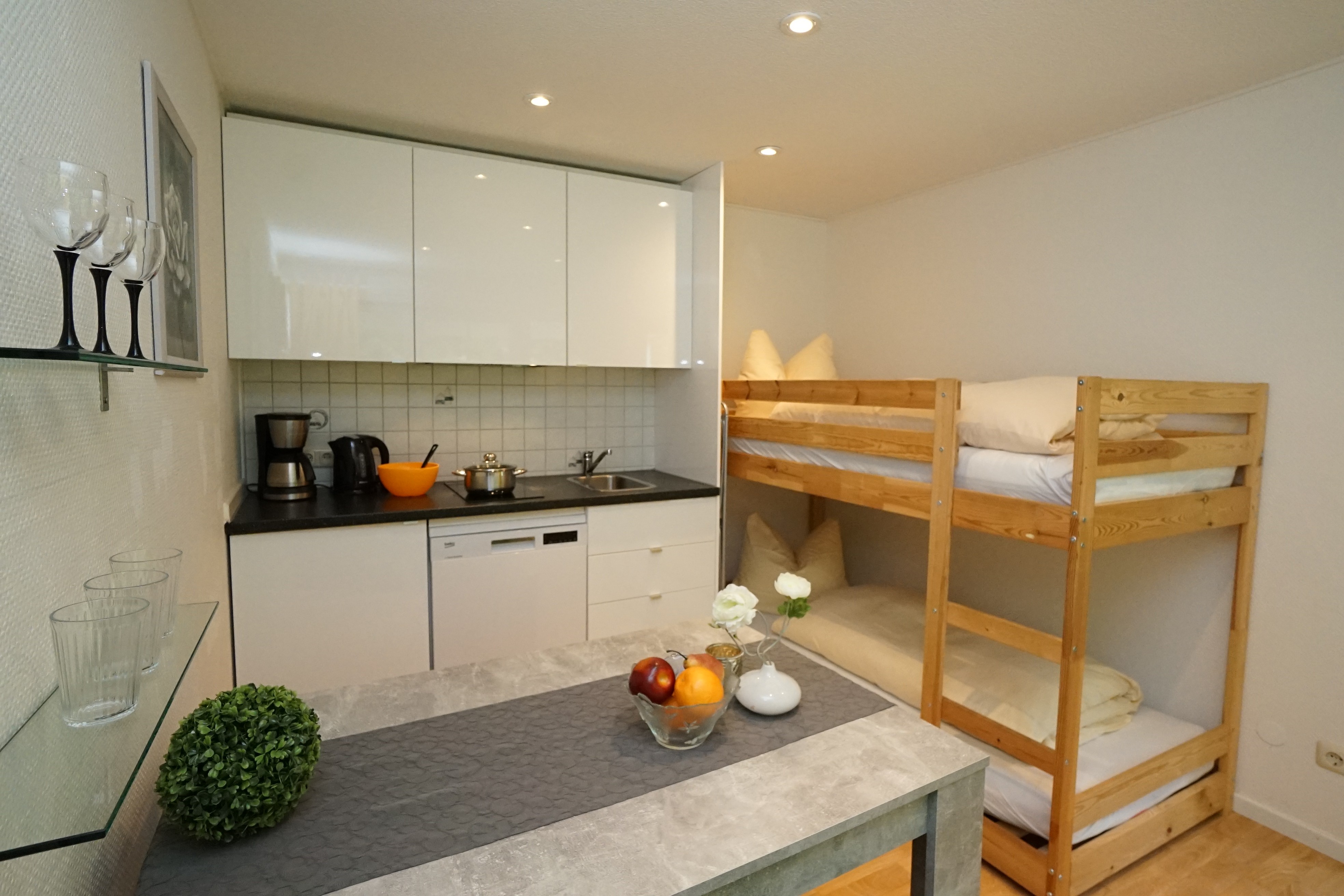 Family room, bunk bed, kitchenette, and table