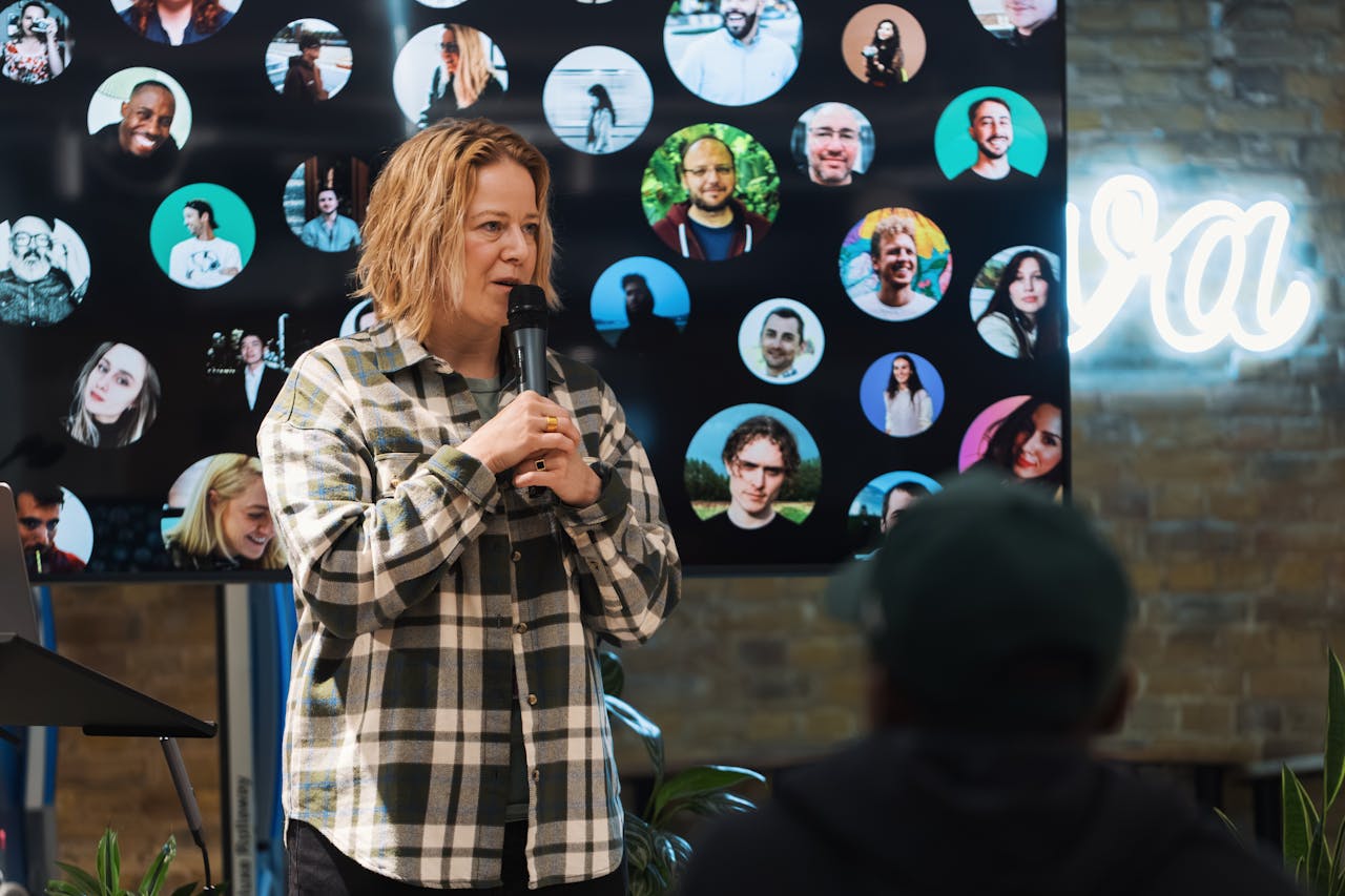 Speaker Presenting at Conference with Audience