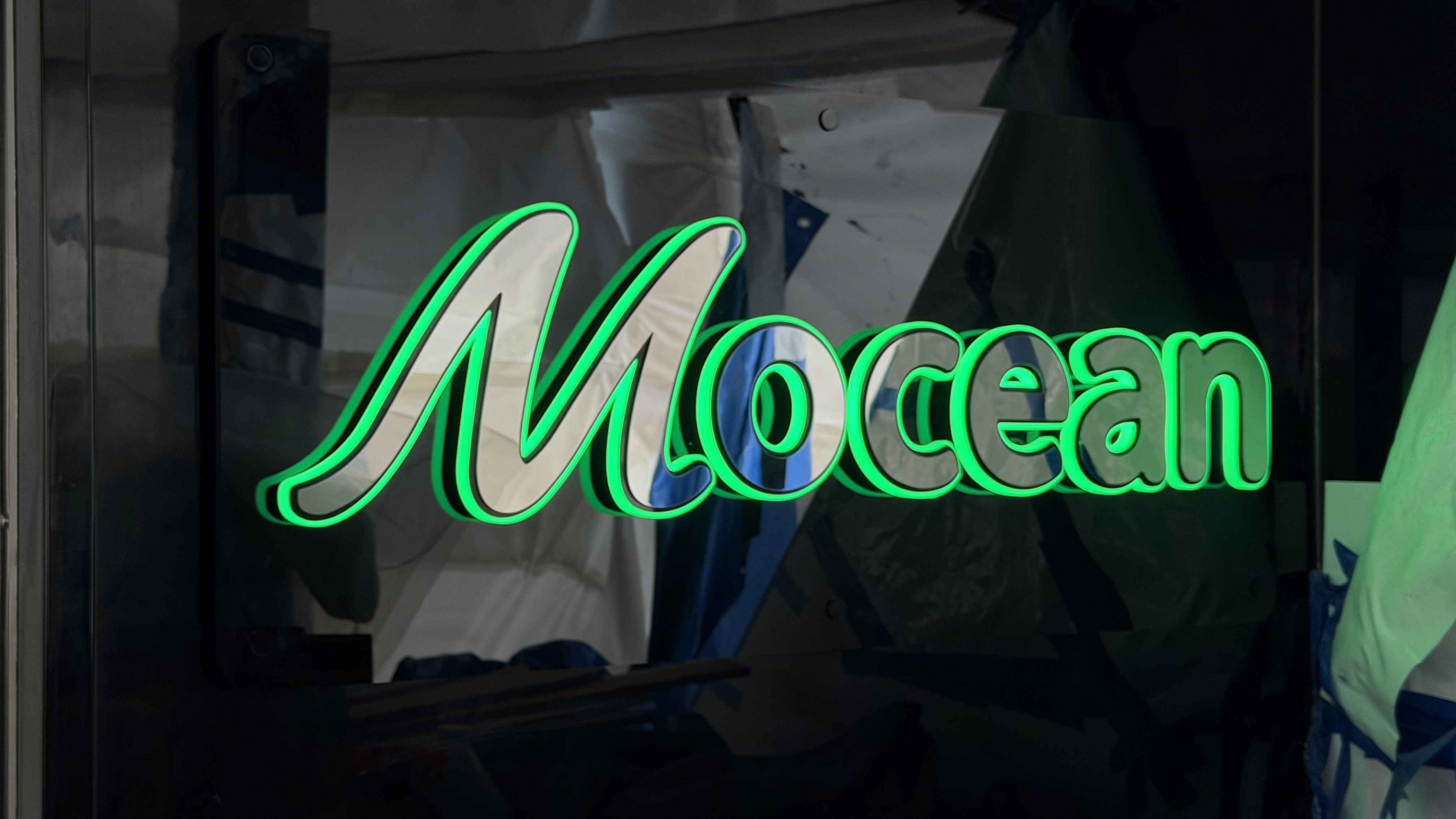 LED backlit yacht name sign Mocean with green illumination