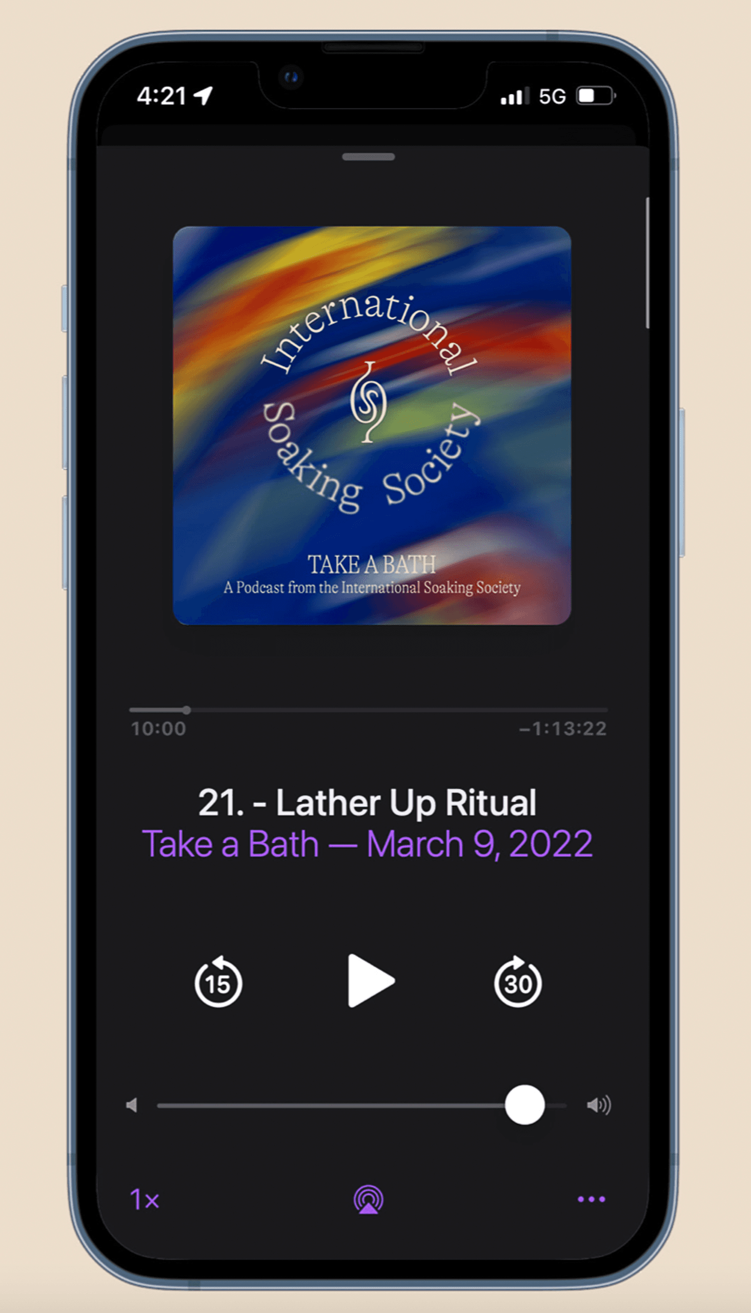 A smartphone displays a music player interface showing a song titled "21. - Lather Up Ritual: Take a Bath – March 9, 2022." The song is listed as 1x and has a play button, fast forward button, repeat button, and volume control. The phone’s status bar indicates the time as 4:21, the battery at 50%, and the signal strength at 5G.