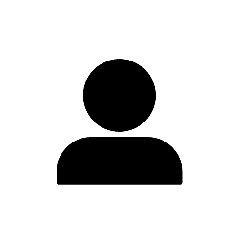 A sleek black speaker with a minimalist design and two beige circular elements. Its glossy surface and rounded edges create a modern, stylish look.