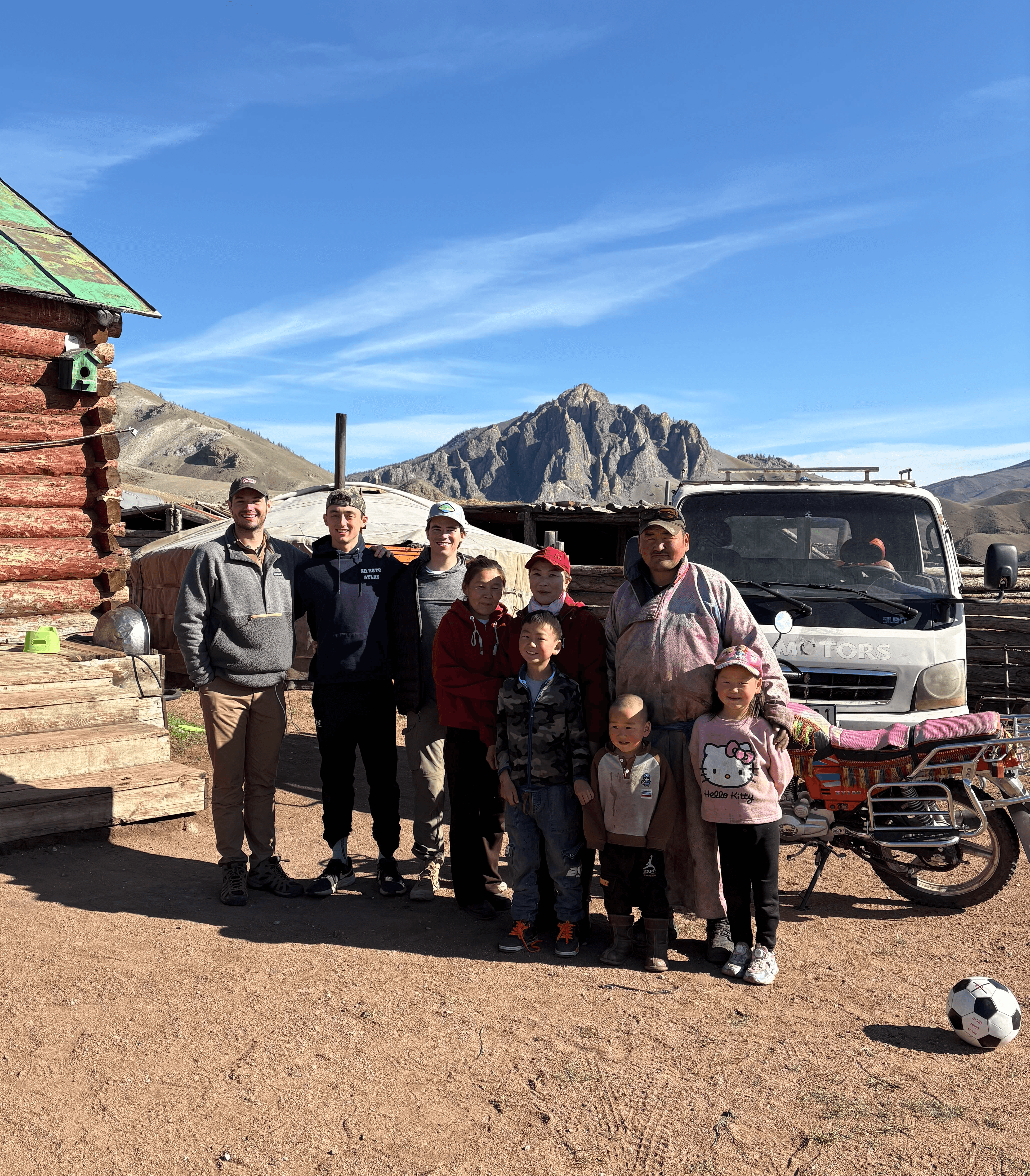 Photo of tourists and nomadic family in Mongolia