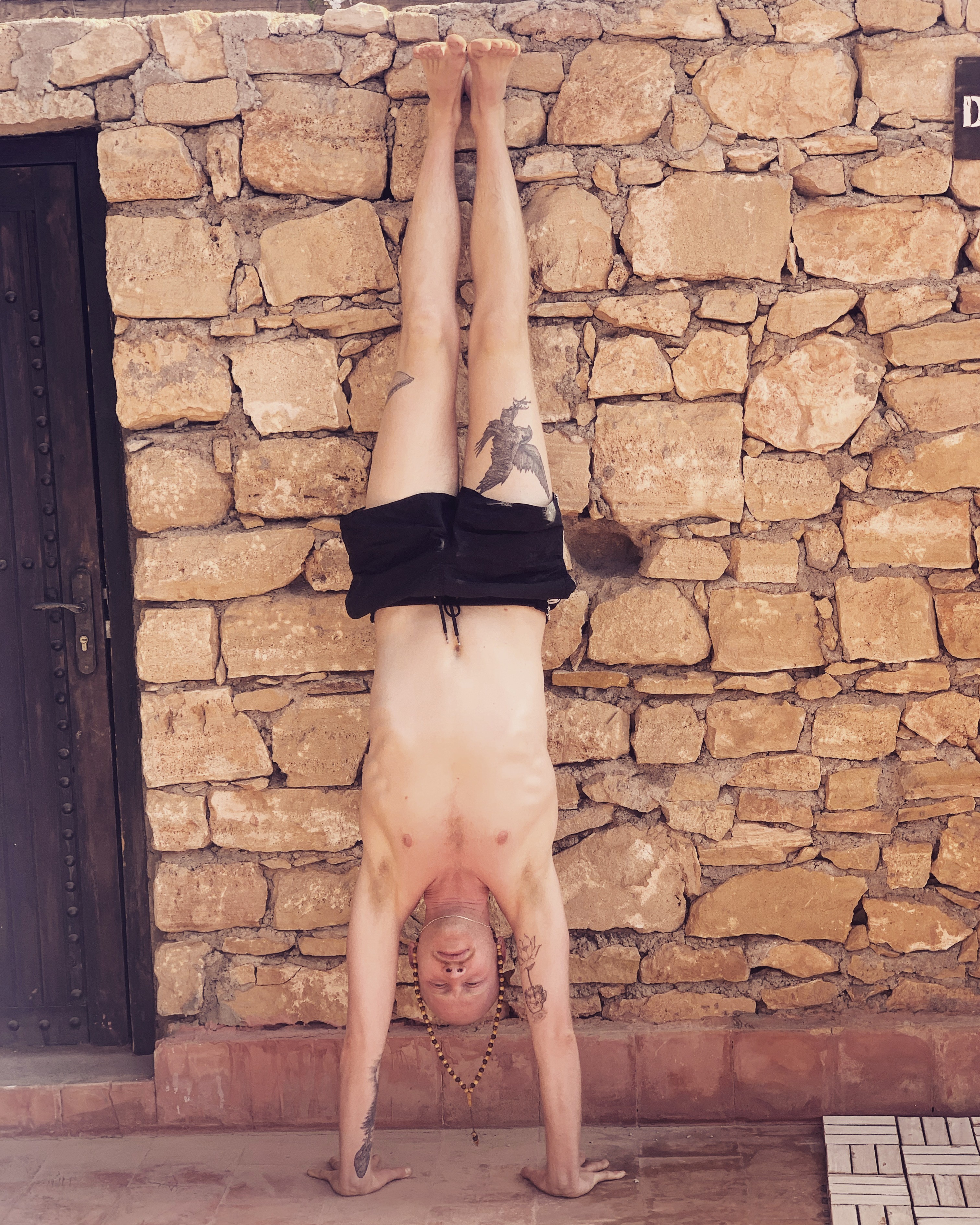 man sitting on cliff