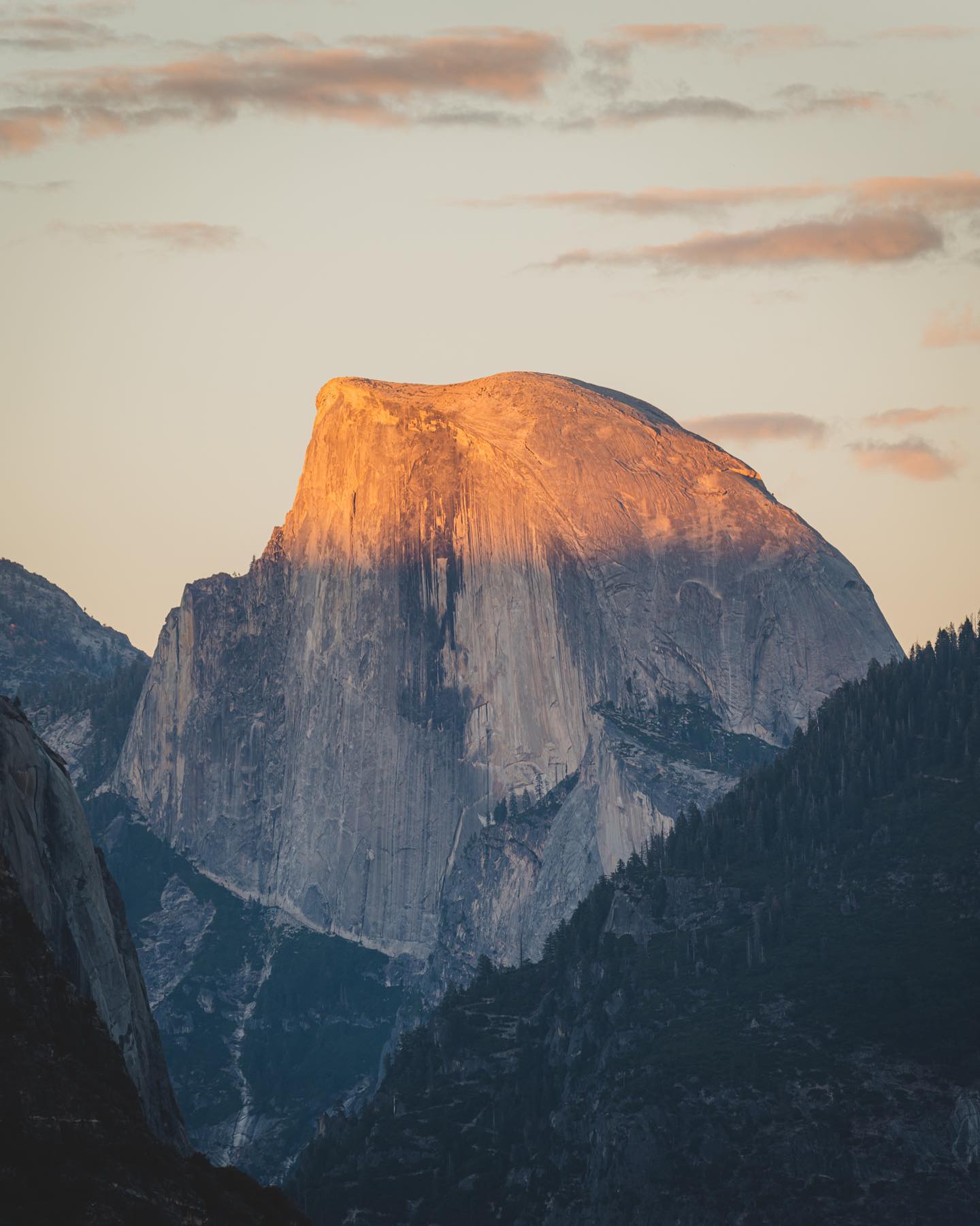 The iconic Half Dome in Yosemite National Park during twilight.