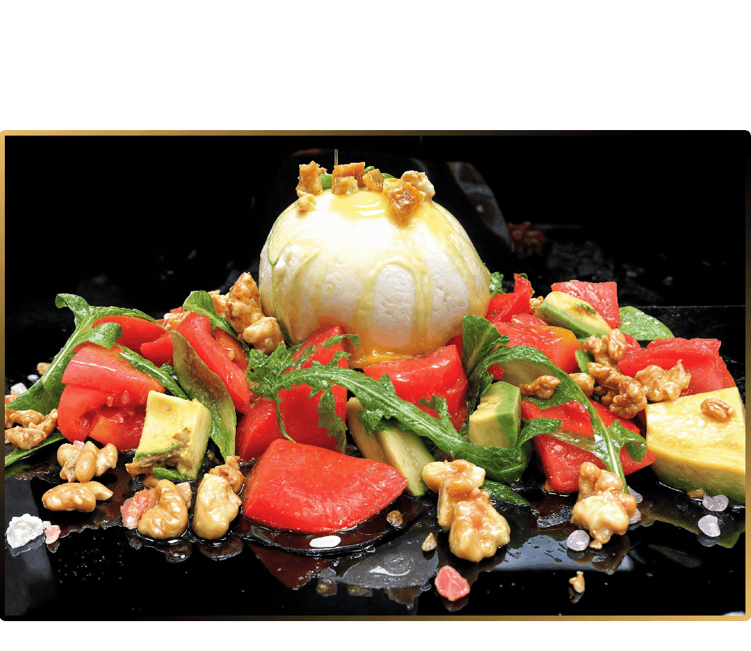 Pink tomatoes with burrata
