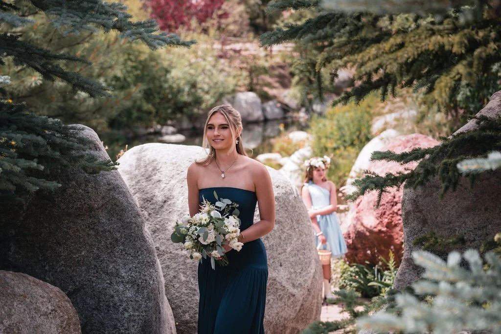 Bridesmaids holding bouquets during Aspen wedding celebration