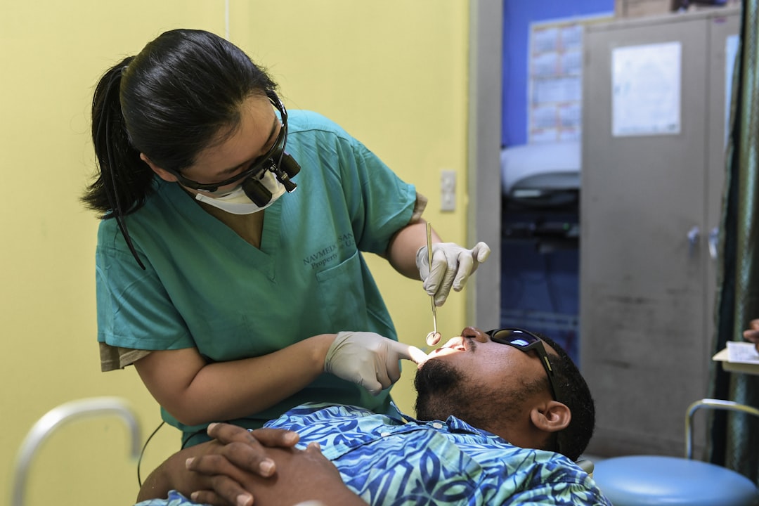 Dentist examining a patient's teeth