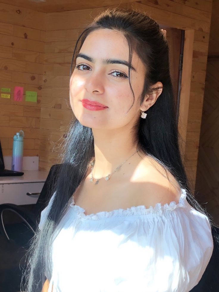 kids lying on a glass land and smiling