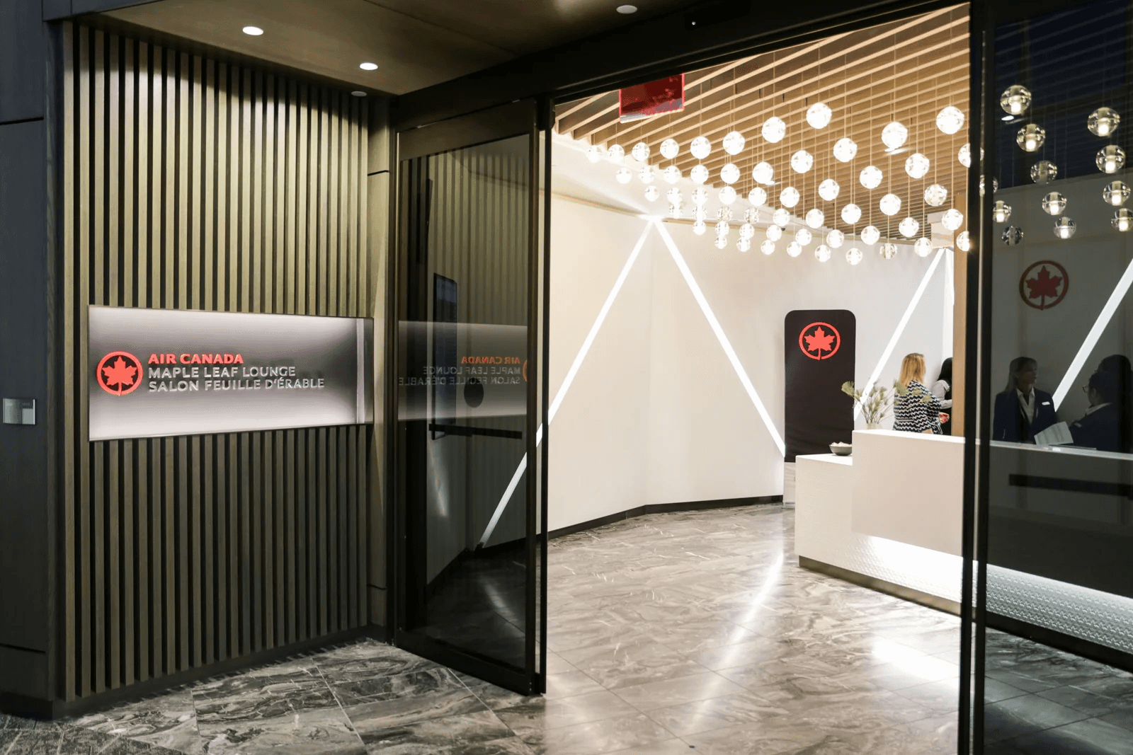 The entrance to an Air Canada Maple Leaf airport lounge. 