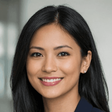 a man in a blue suit posing for a picture
