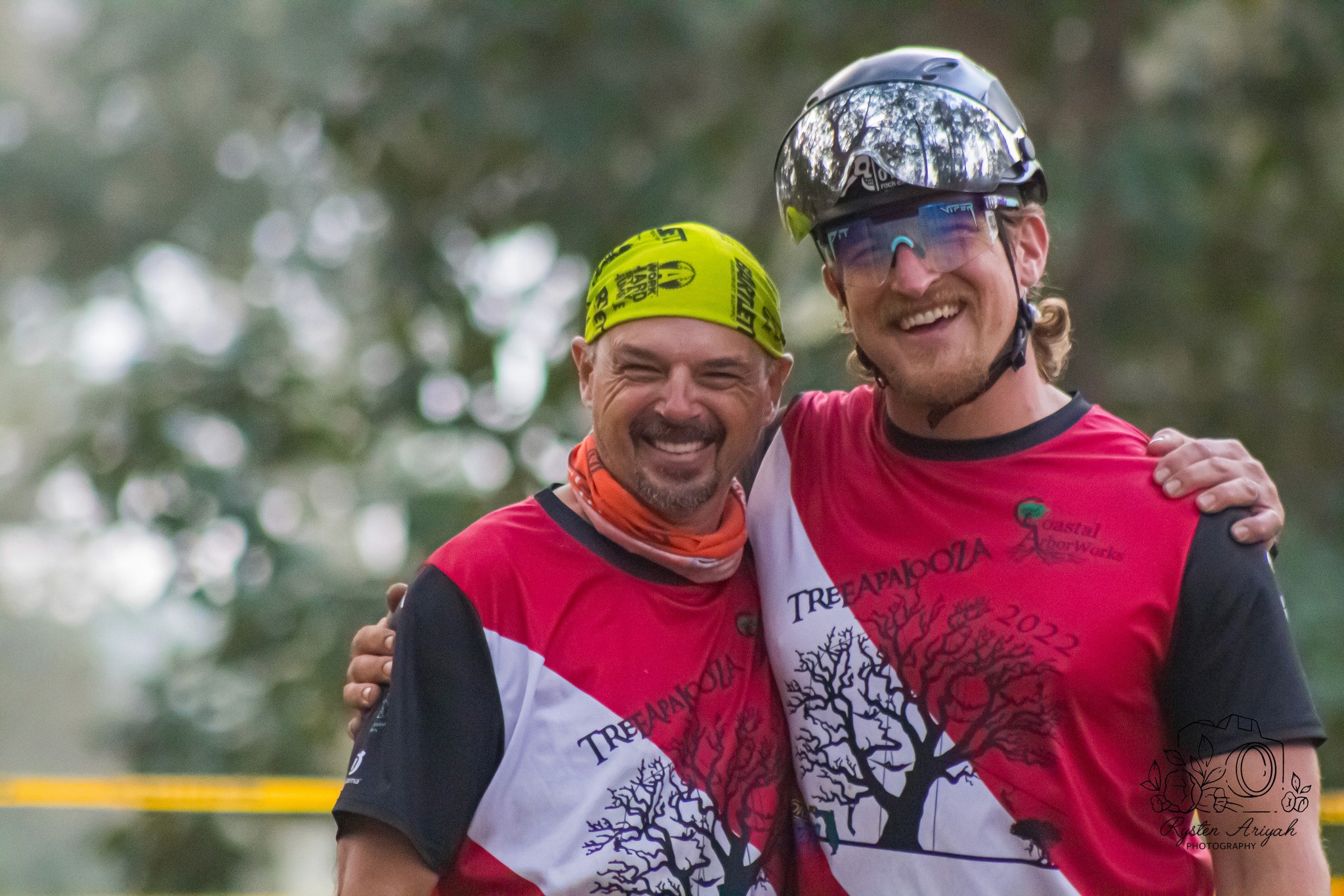 two participants hugging and smiling at treeapalooza 2022