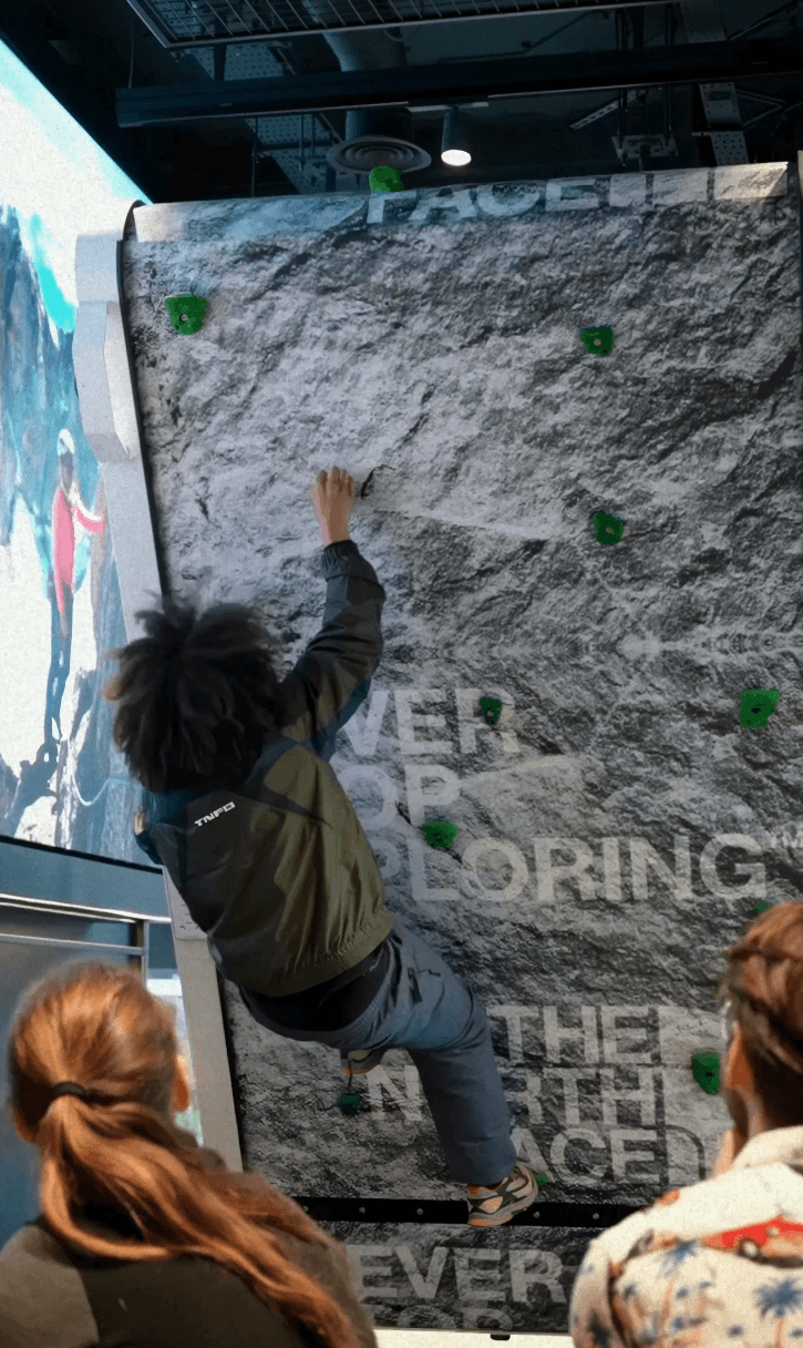 Couple embracing on street, bride's face obscured