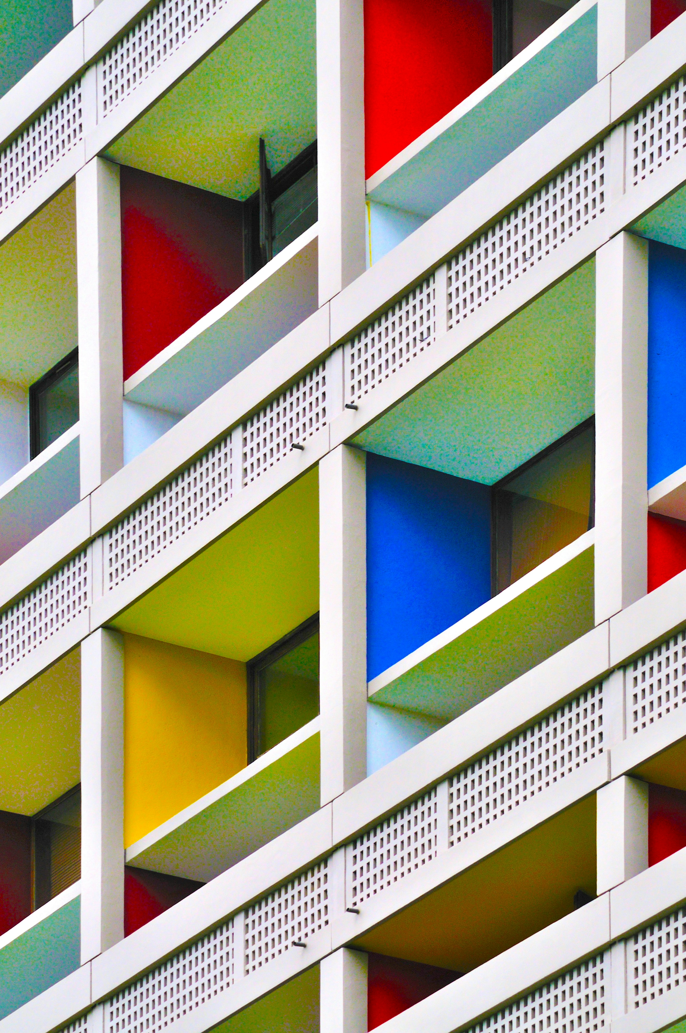 Colorful balconies on a modern building facade