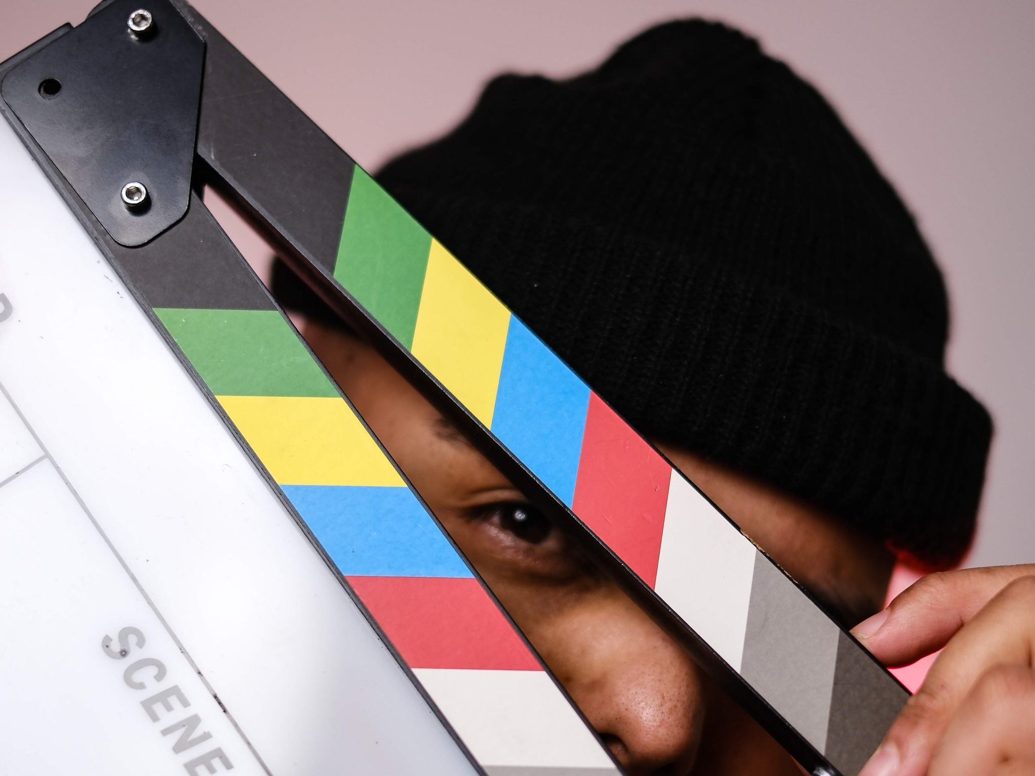 Black and white photo of man posing on camera