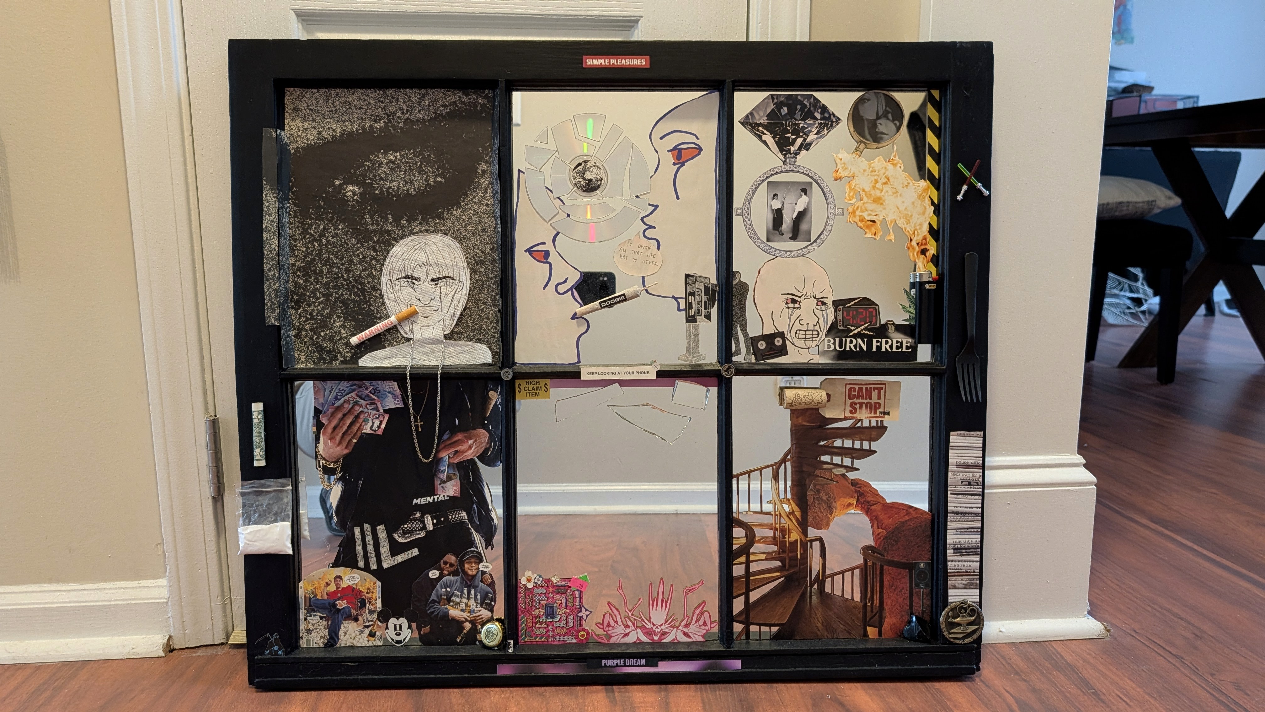 multimedia collage piece on a mirror