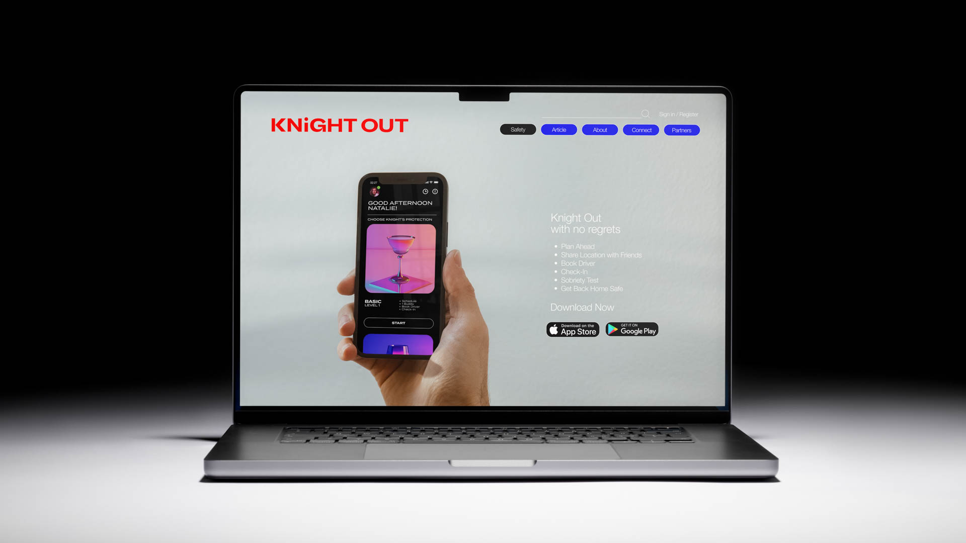 A silver laptop displays a webpage titled "KNIGHT OUT" in red text at the top left. The webpage shows a smartphone displaying a colorful image on its screen. The text on the webpage reads: "Knight Out with no regrets. Plan ahead. • Plan Ahead • Plan Ahead • Location with Friends • Check-in • Check-out • Schedule Test • Get Back Home Safe." Below the phone image are icons for Apple App Store and Google Play. The laptop is positioned on a light gray surface against a black background.