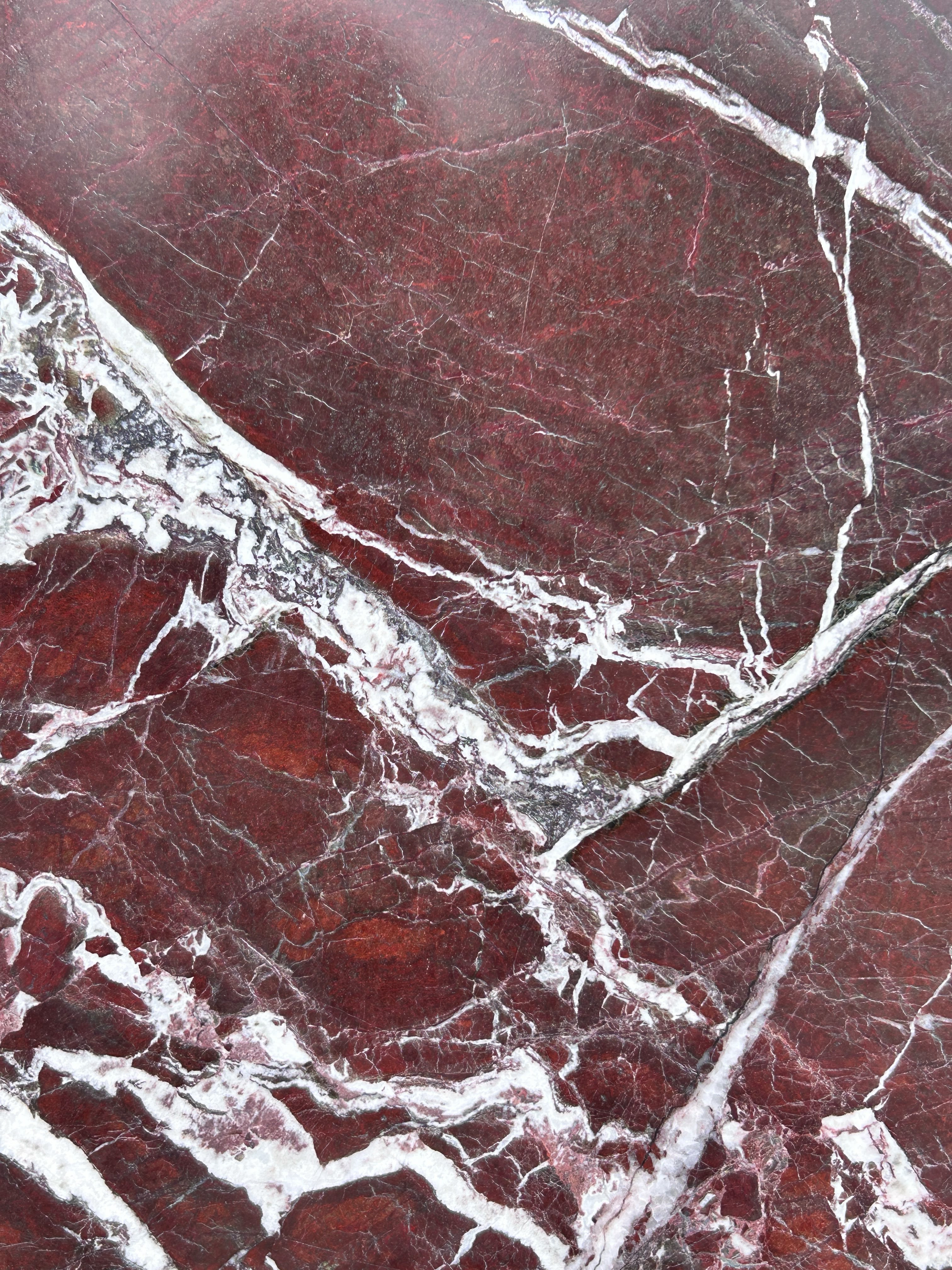 Rosso Levanto marble slab from Italy with deep burgundy red colour and white veining