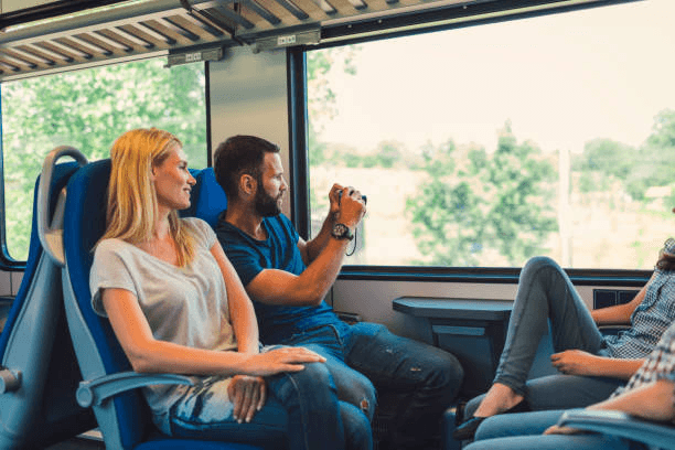 Passengers inside a Spanish train enjoying a relaxed journey