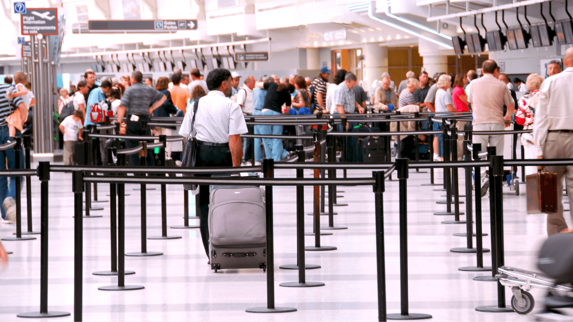 Huge line of travelers at the airport