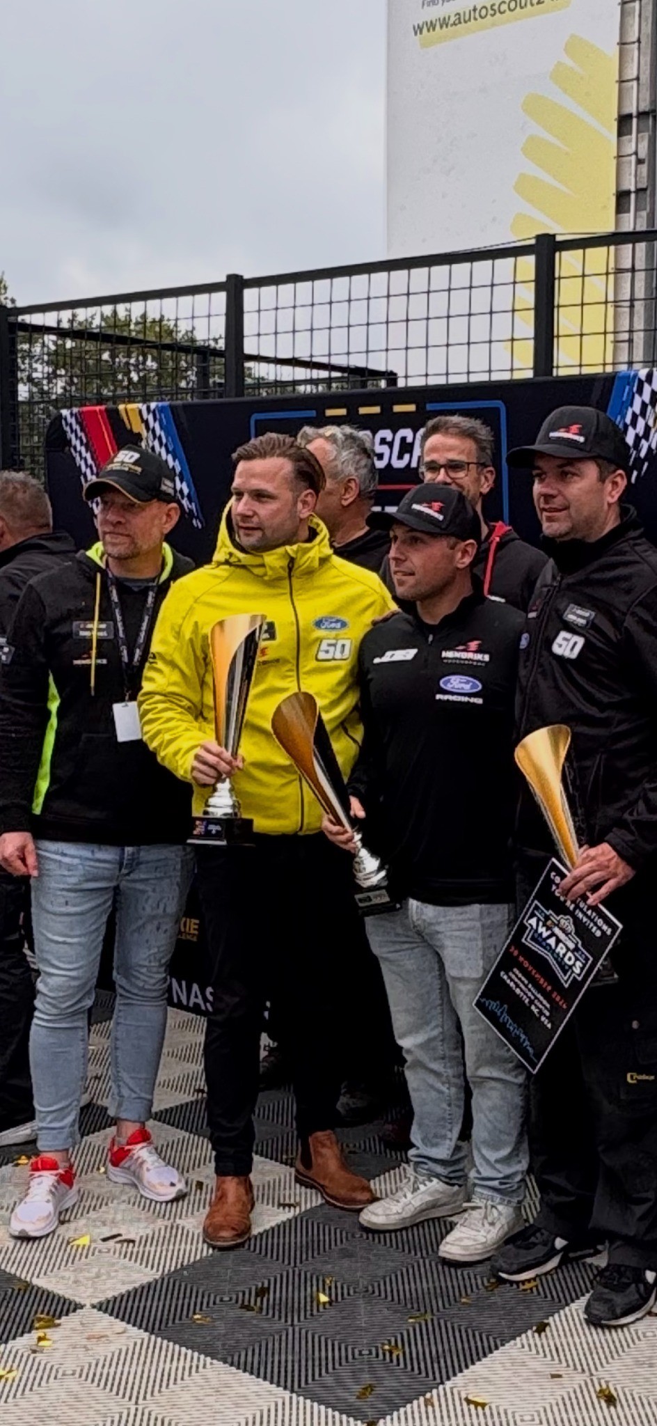 Mustang number 50 drivers with team principal Roy Hendriks and trophies