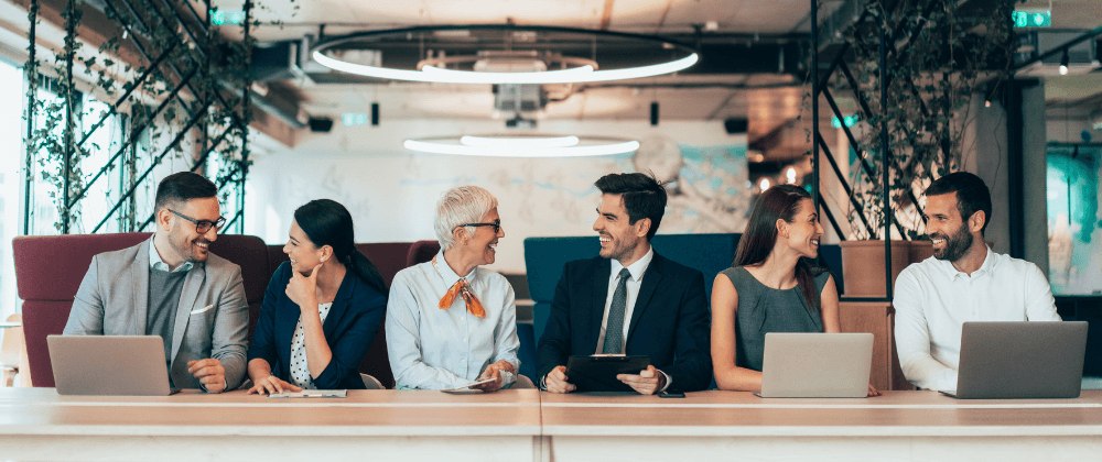 Corporate pairs at a conference table
