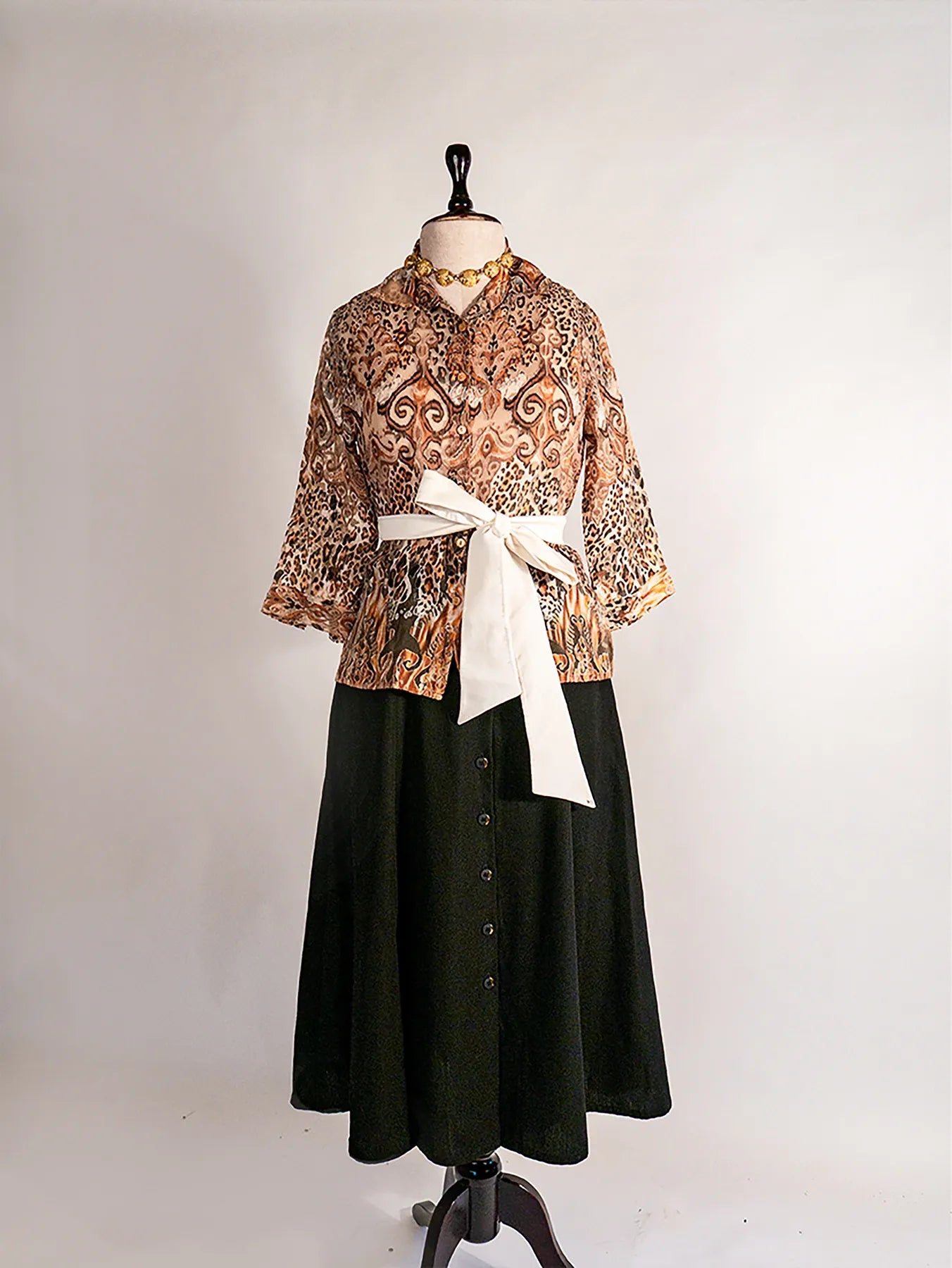 Vintage mixed animal print blouse with 3/4 sleeves.