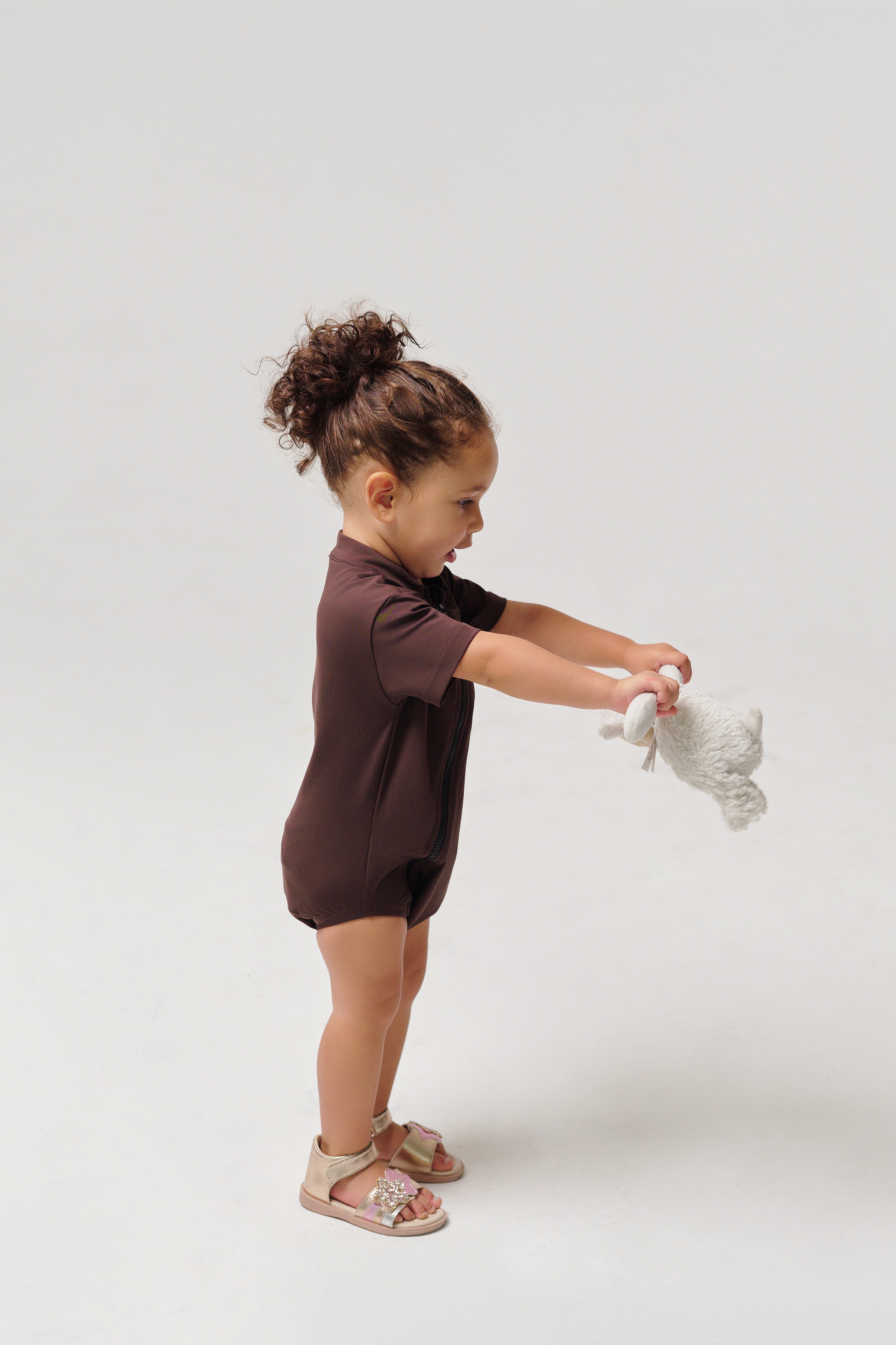 Friends laughing and posing inside a car