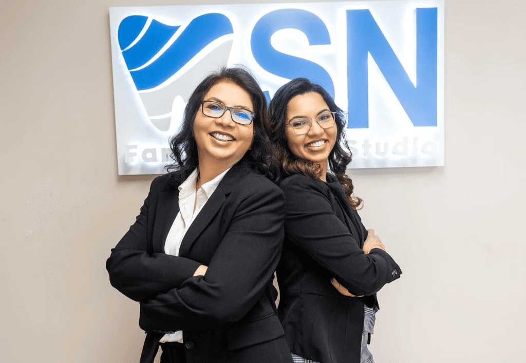 Dr. Navneet Rai and Dr. Simrann Rai Sethi posing in Milltown NJ Dental Office