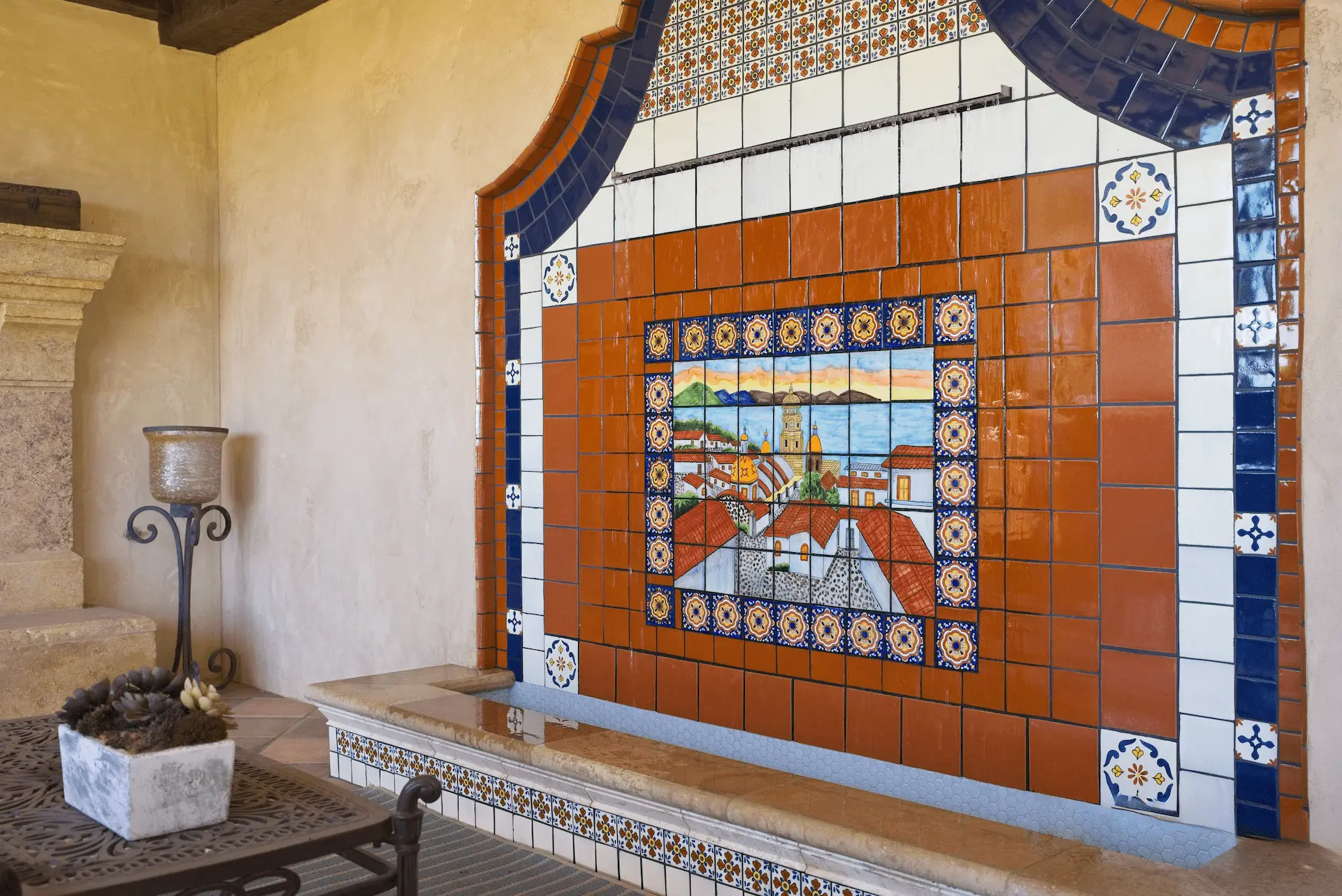 Wide view of the stunning custom mosaic tile water feature, adding a touch of artistic elegance to the San Juan Capistrano property. Photo by Todd Huge.