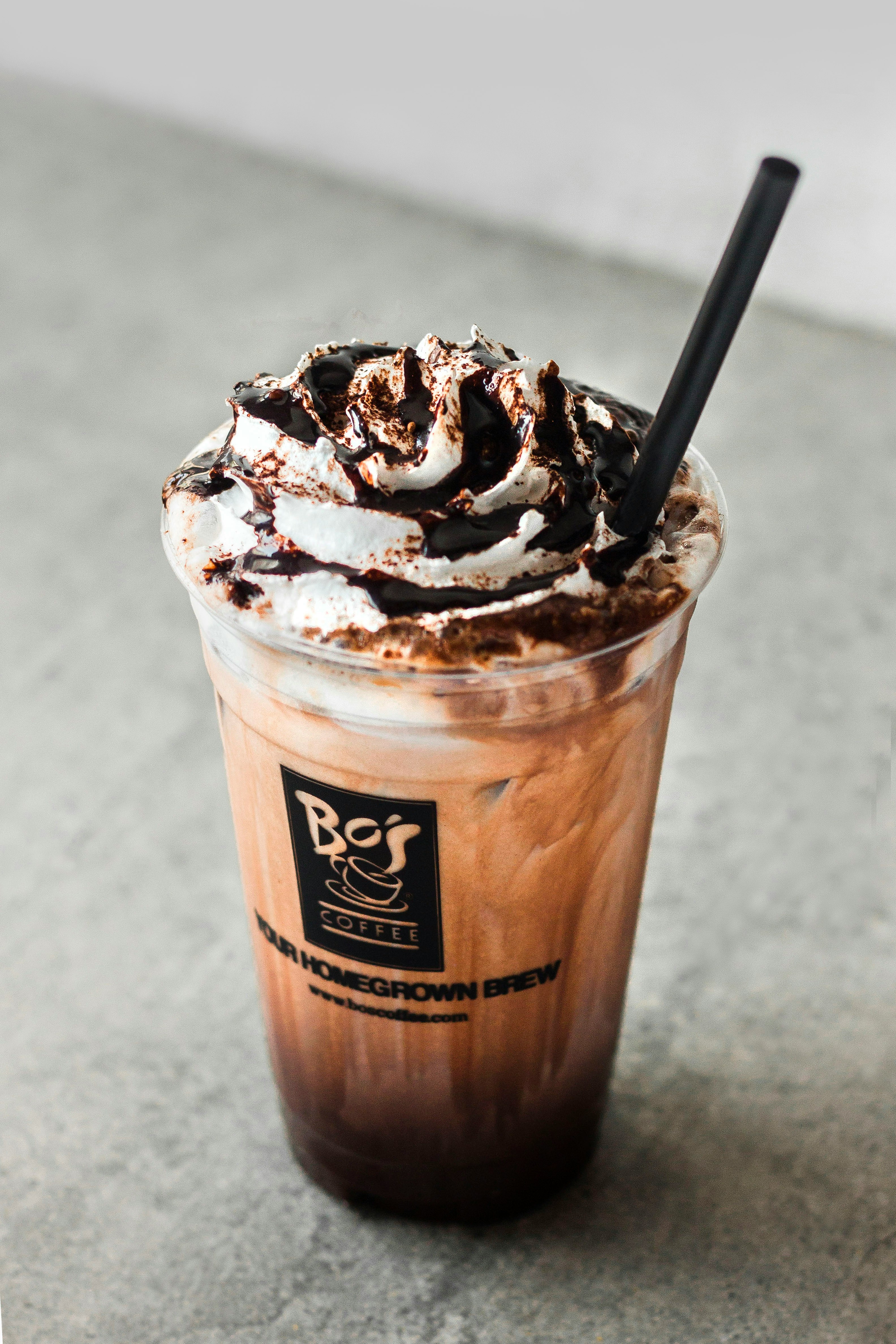 ice coffee cup on gray surface