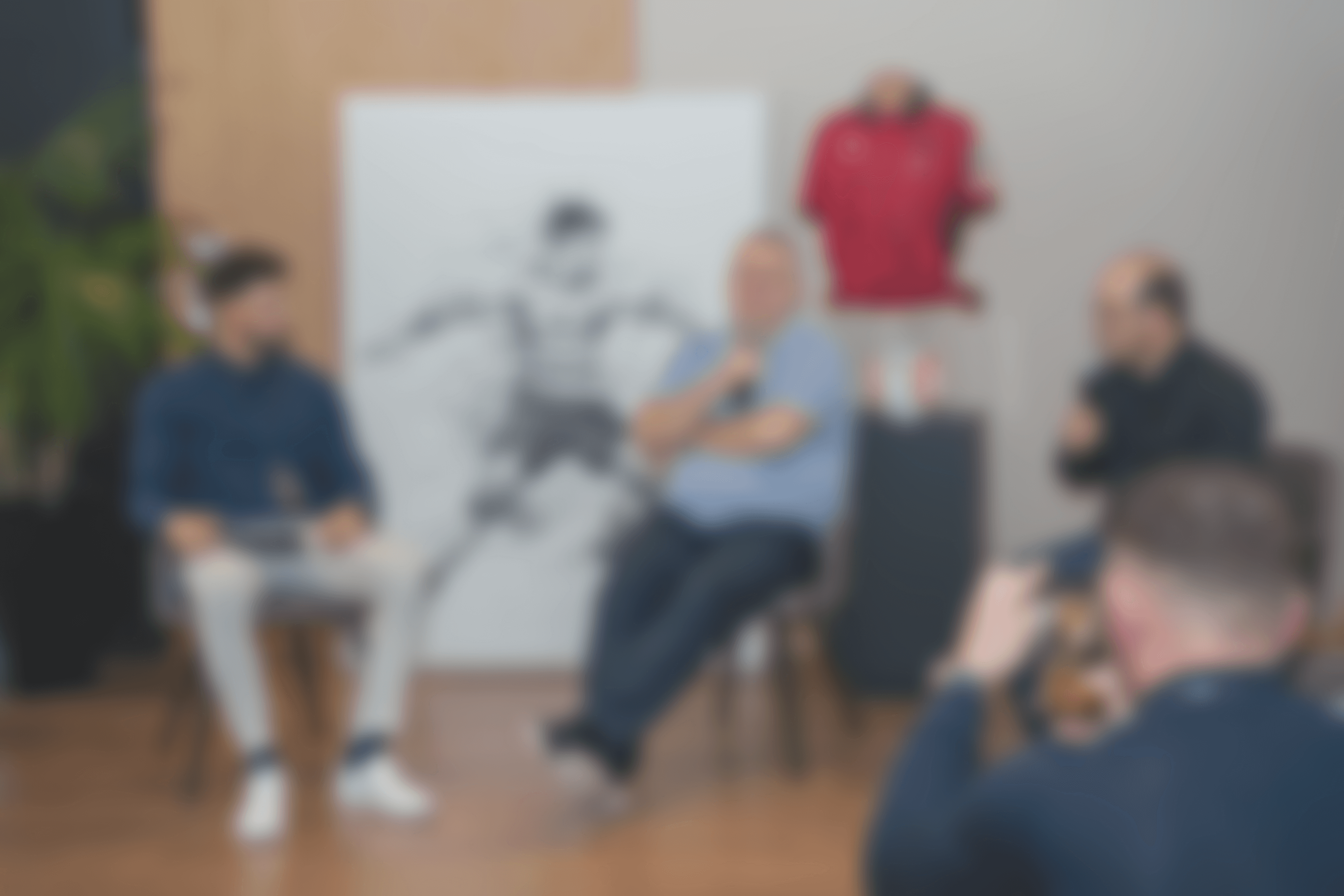 Modern spiral staircase with wooden accents and lighting