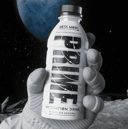 An astronauts hand holding a white bottle of Prime Meta Moon drink