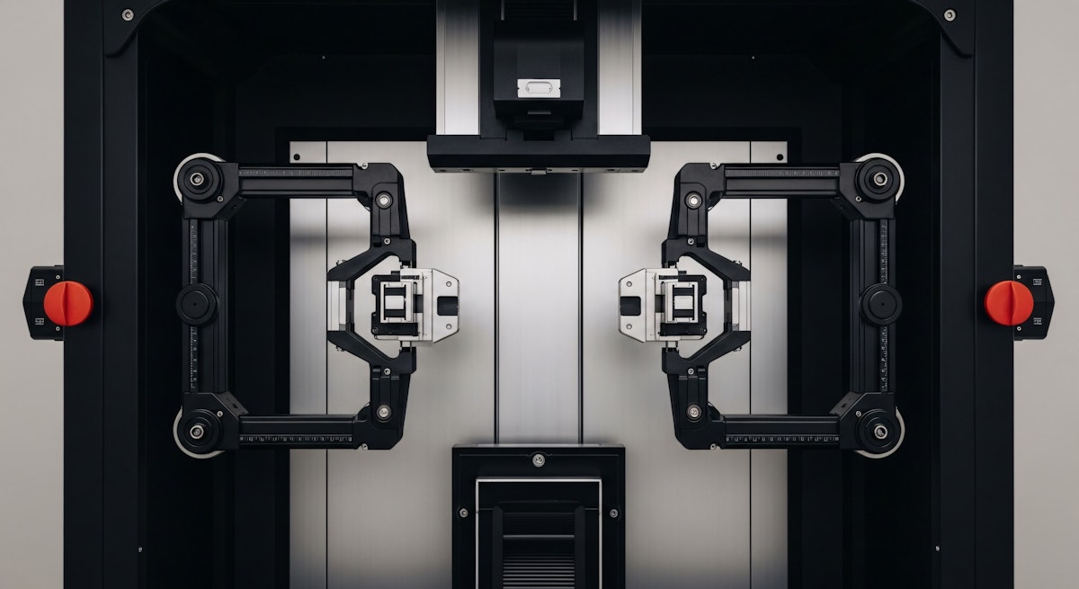 a man with dreadlocks standing in front of a building