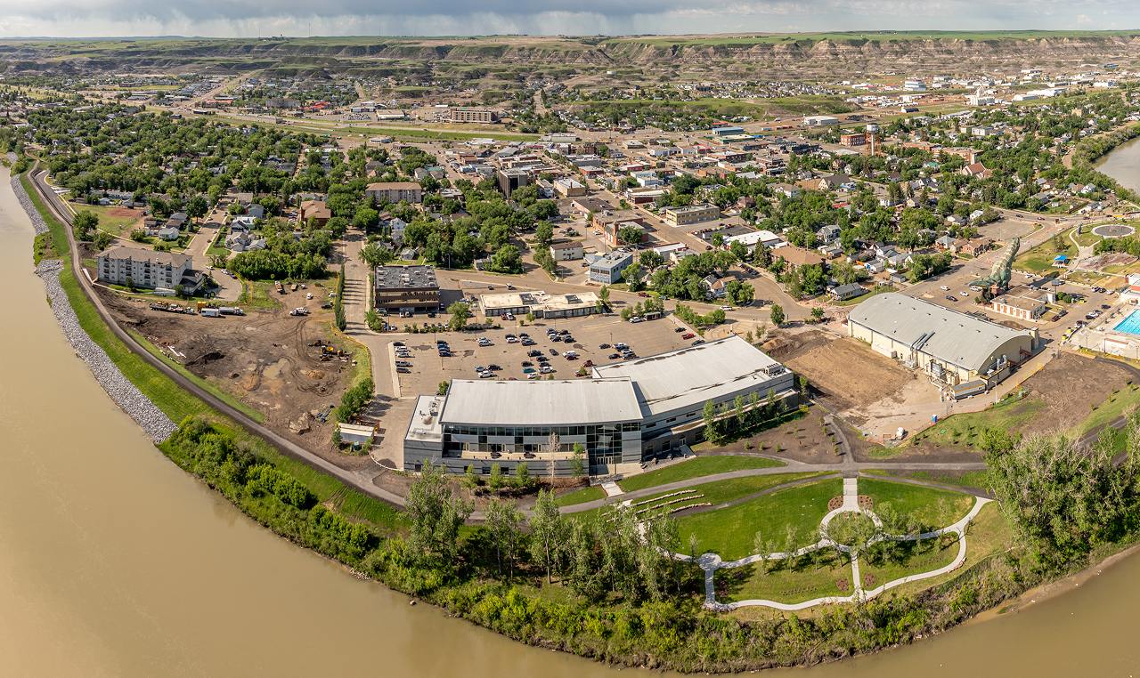 Aerial perspective of Drumheller downtown dike system protecting buildings from Red Deer River flooding