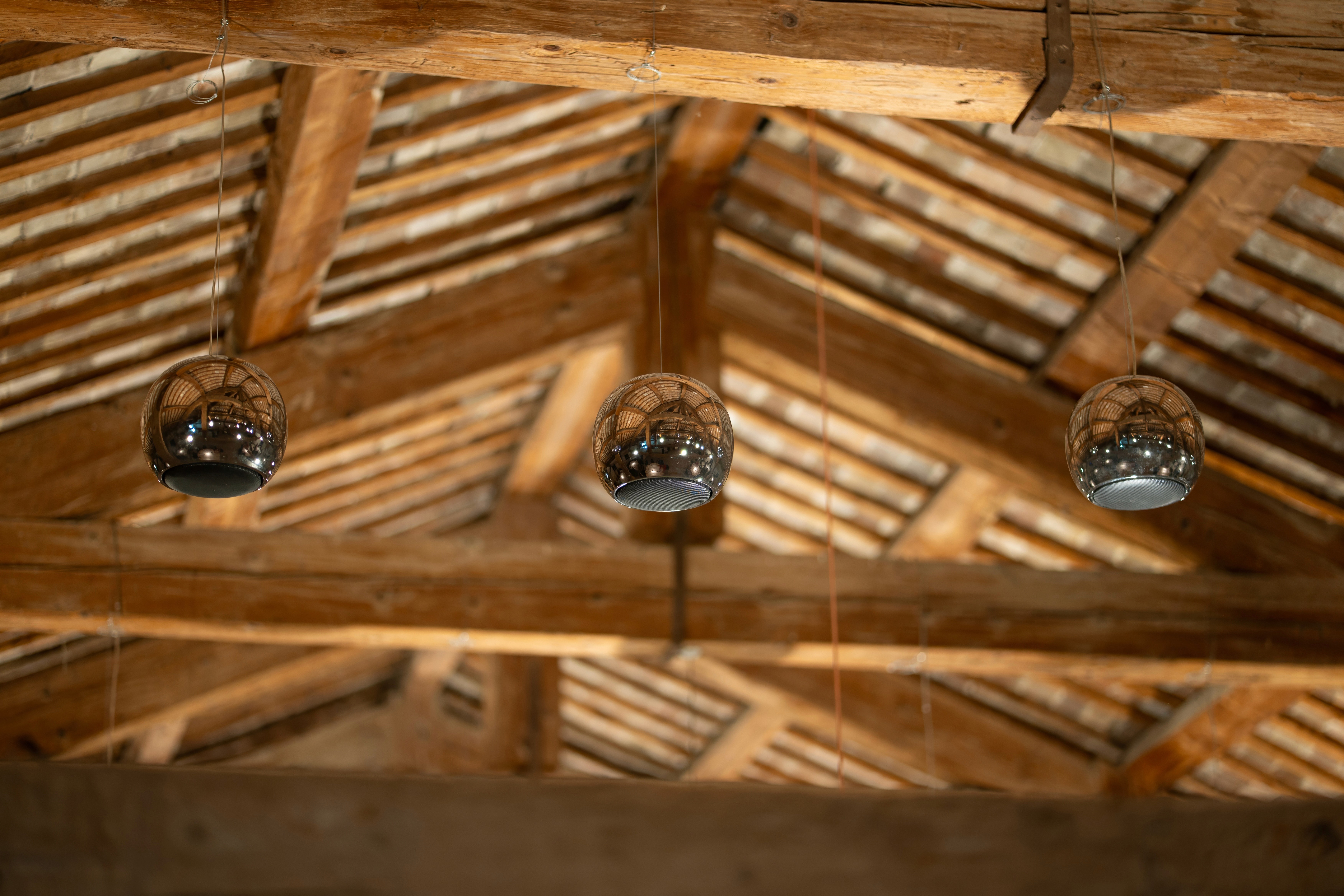 Streetside billboard with flyposters of the Batch.Works brand and illustrations