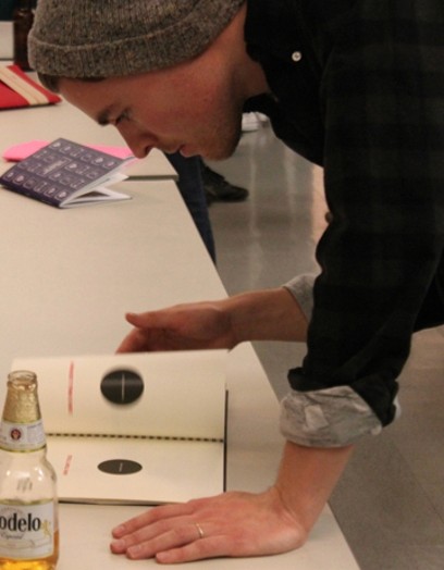 student looking at the book