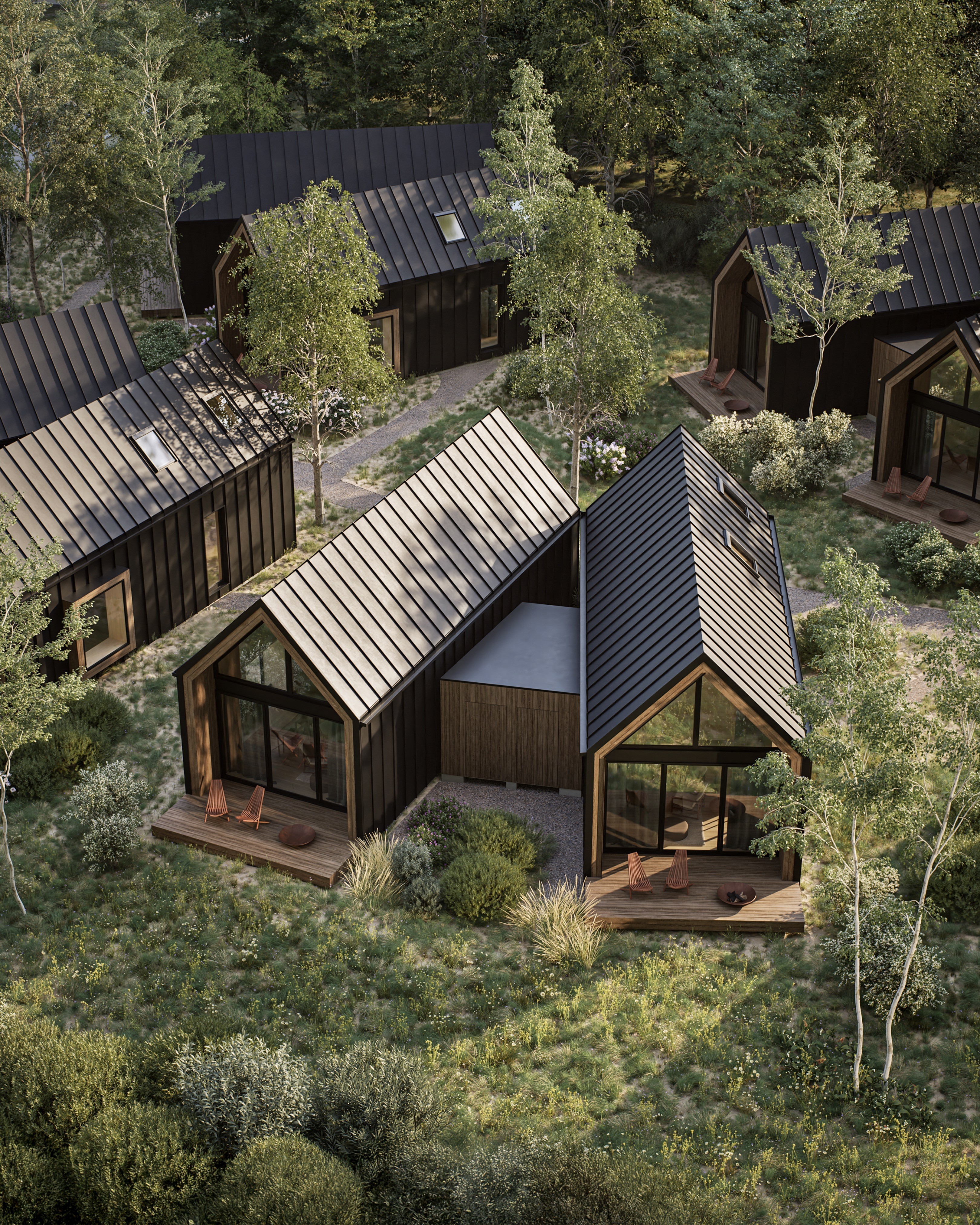 Child walking on a wooden beam with a large tree and swing nearby in a courtyard of modern wooden houses, while another person adjusts a bicycle.