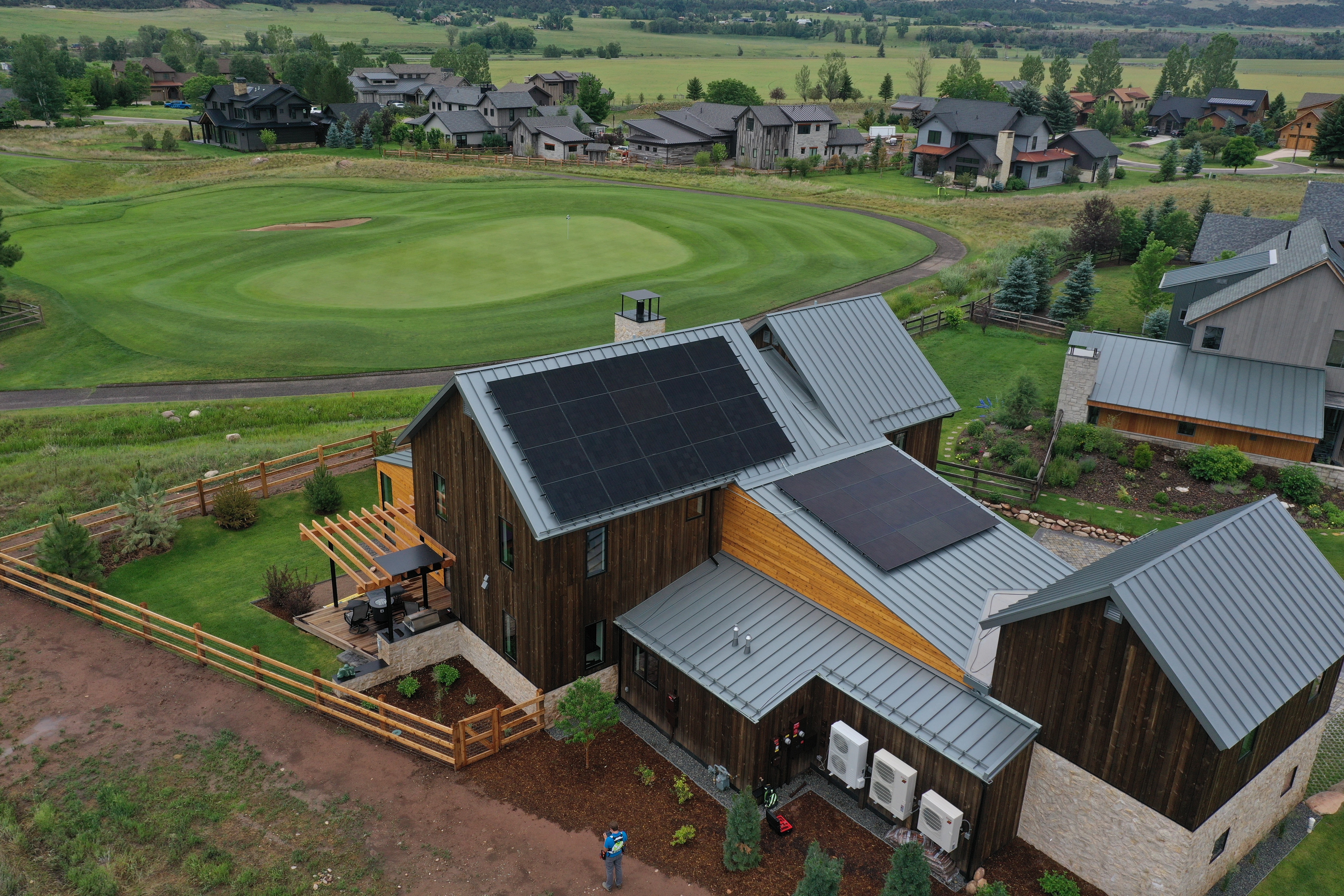 aerial view of house with solar panels