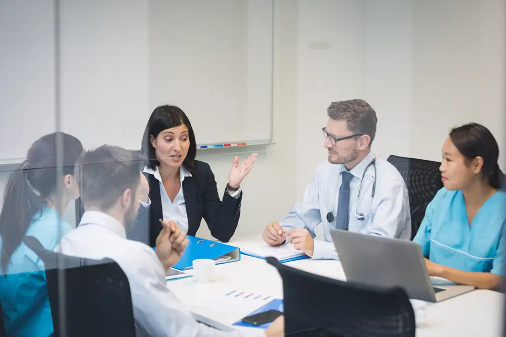 Healthcare leadership discussing employee retention strategies