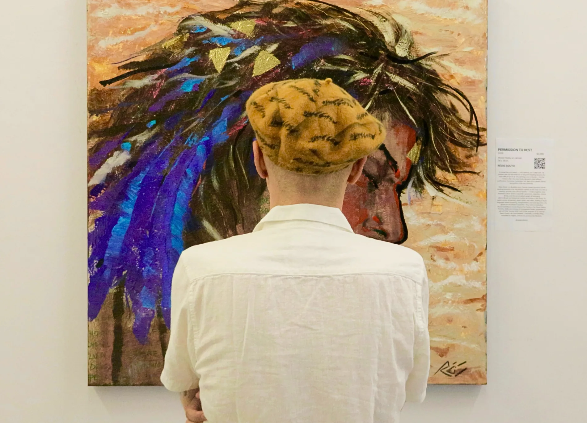 Man in front of painting - OddFolk Studio
