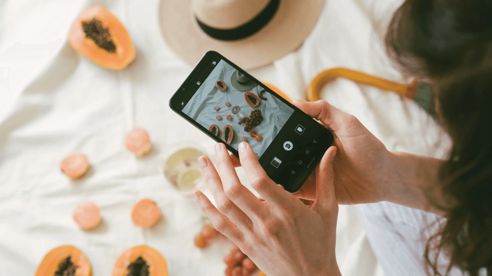 A person taking a picture of food
AI-generated content may be incorrect.