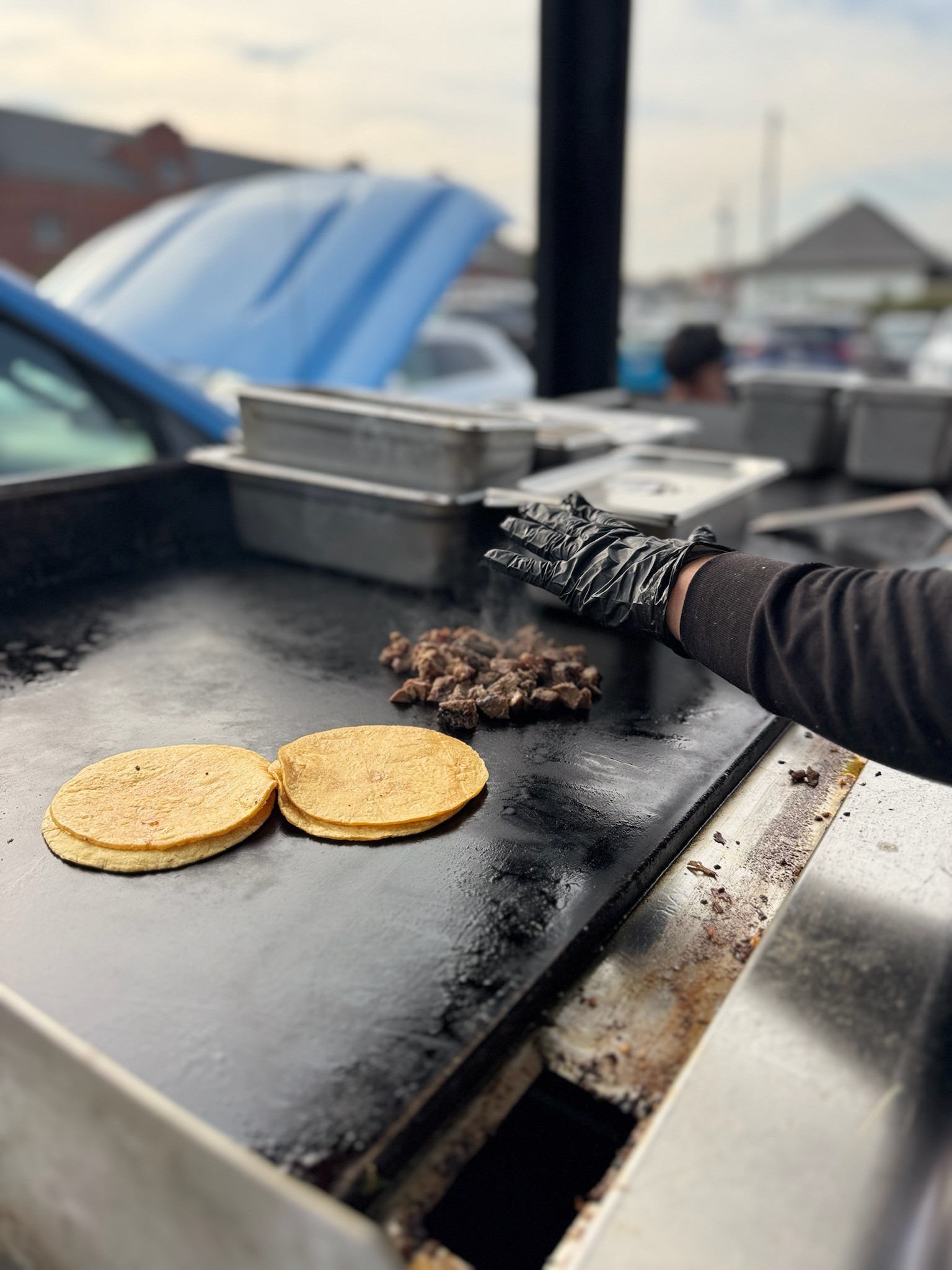 Placing Steak On Grill Image