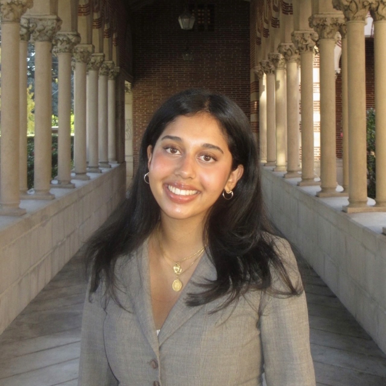 Stylized blue-toned illustration of a bearded man in profile wearing glasses and a collared shirt.