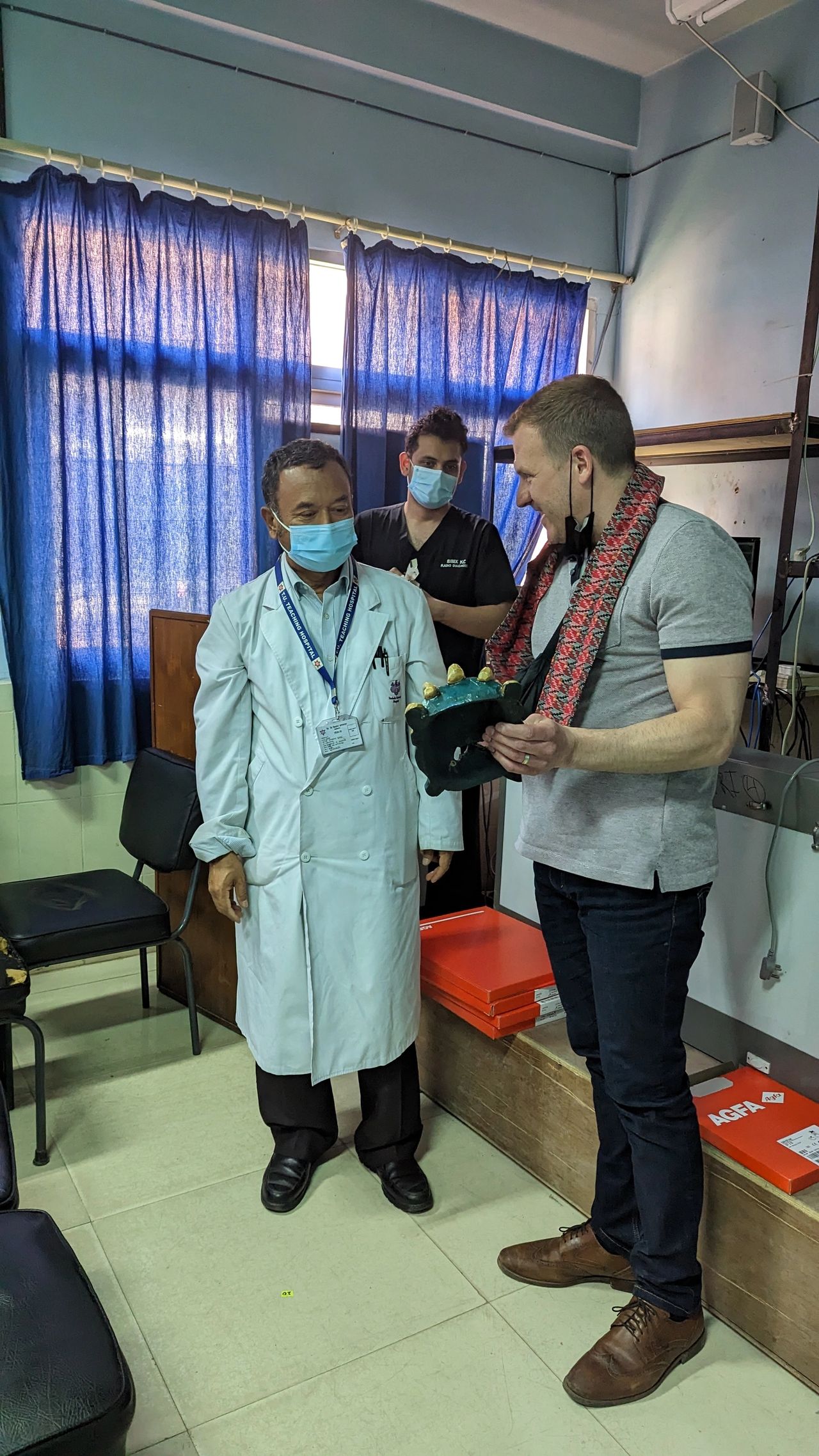 Recieving a thank you gift from the Tribhuvan University Teaching Hospital