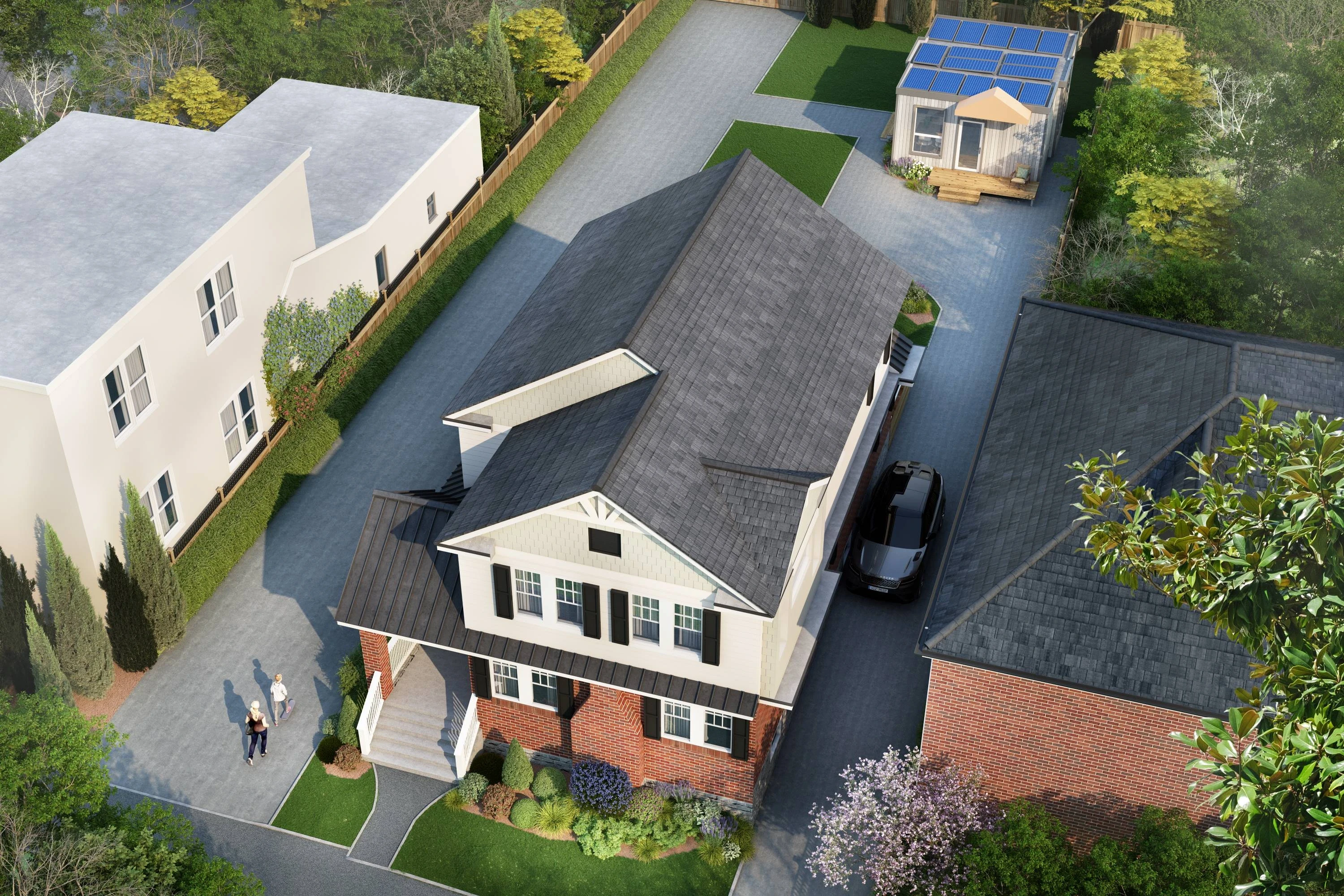 Aerial view of a suburban residential property showing house, driveway, and surrounding space used for an ADU space check.