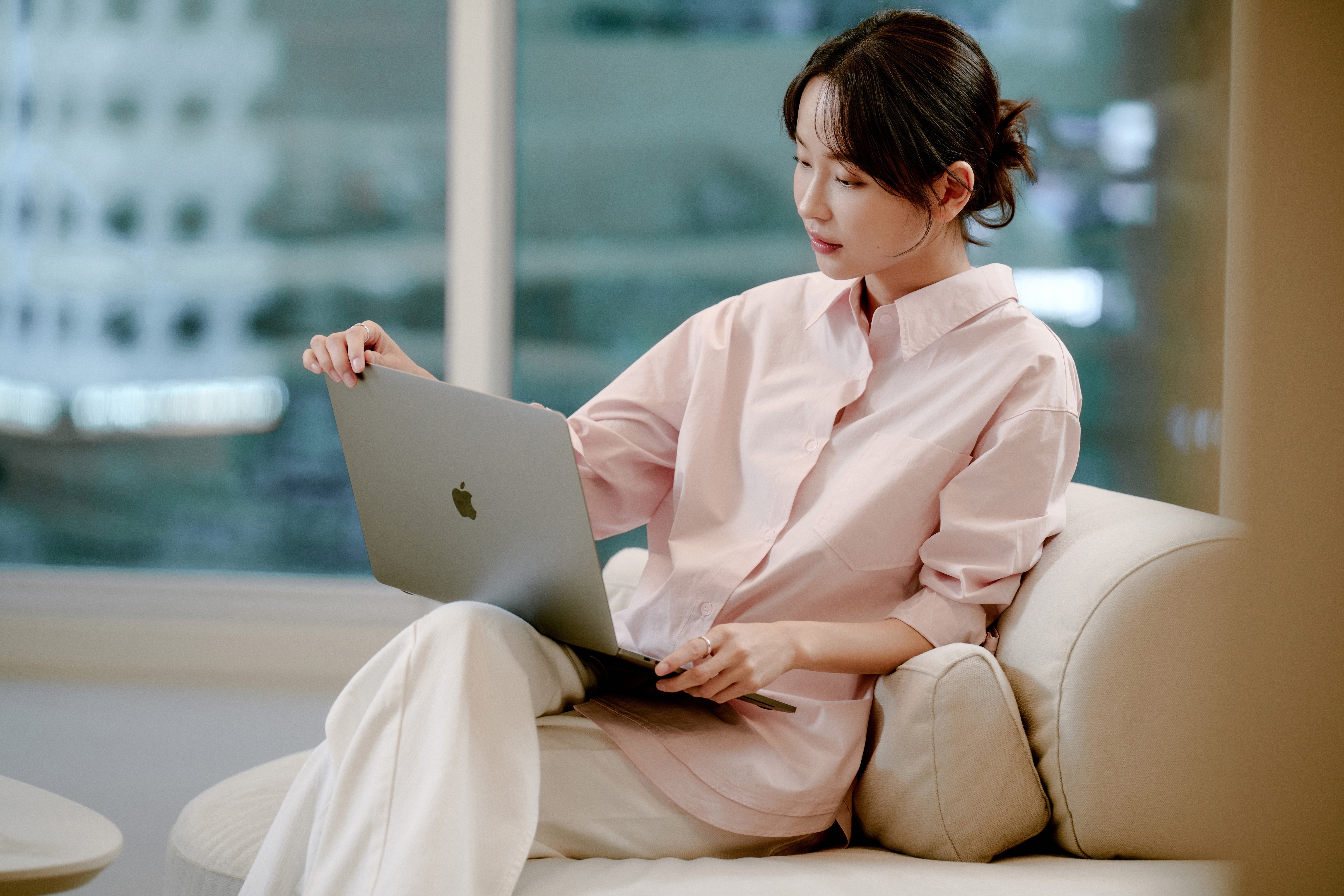 Two students smiling during a language learning session at 612 Academy, reflecting an engaging and human-centered learning experience.