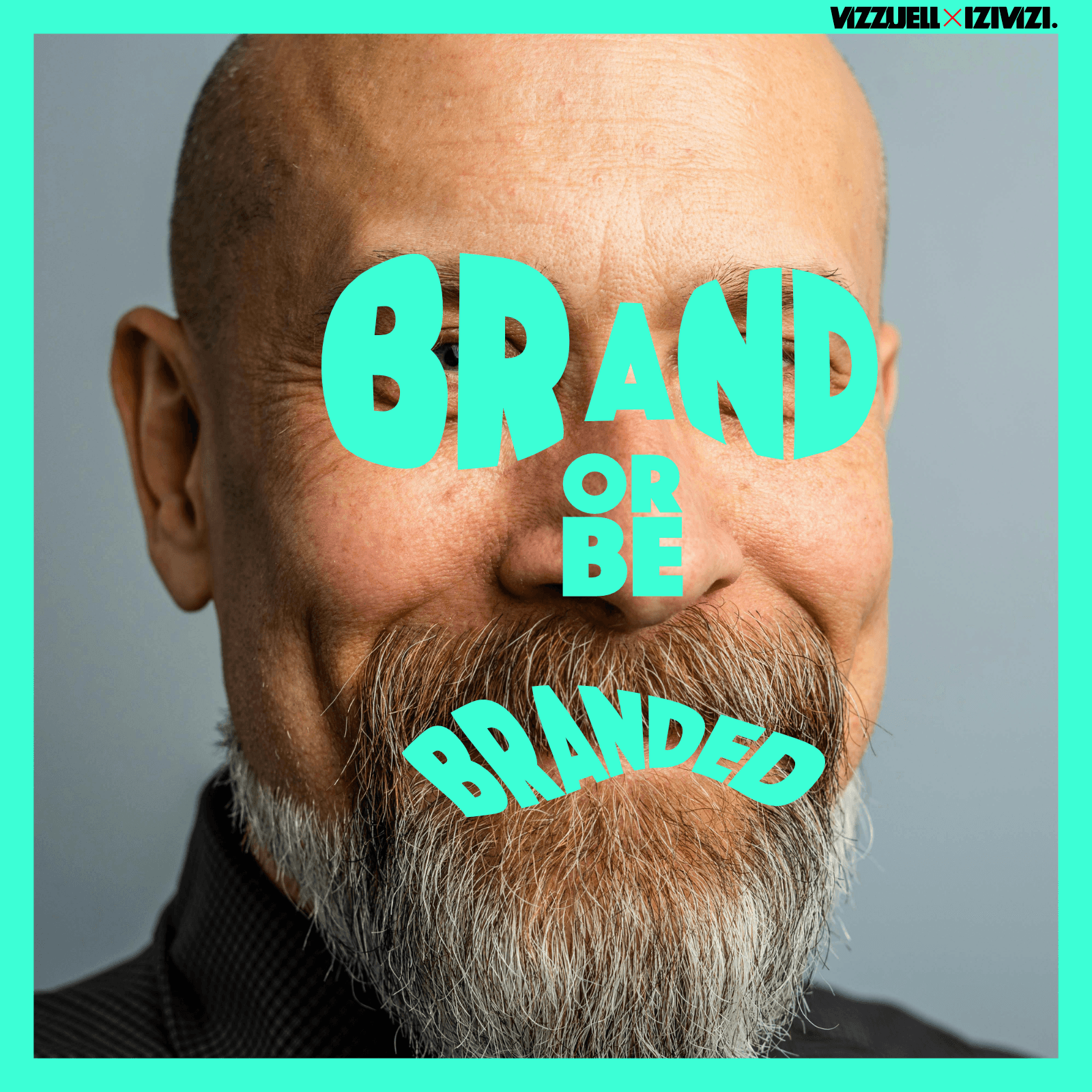 middle aged bearded man wearing what looks like the word brand as sunglasses and branded as his mouth