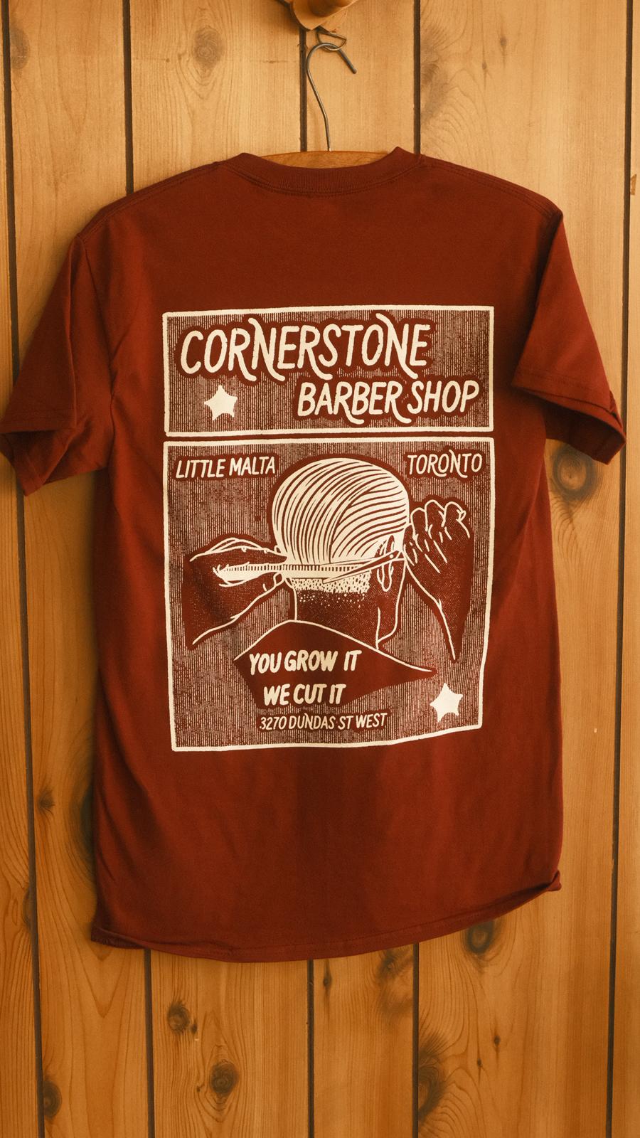 Cornerstone Barber Shop tee in maroon with white print