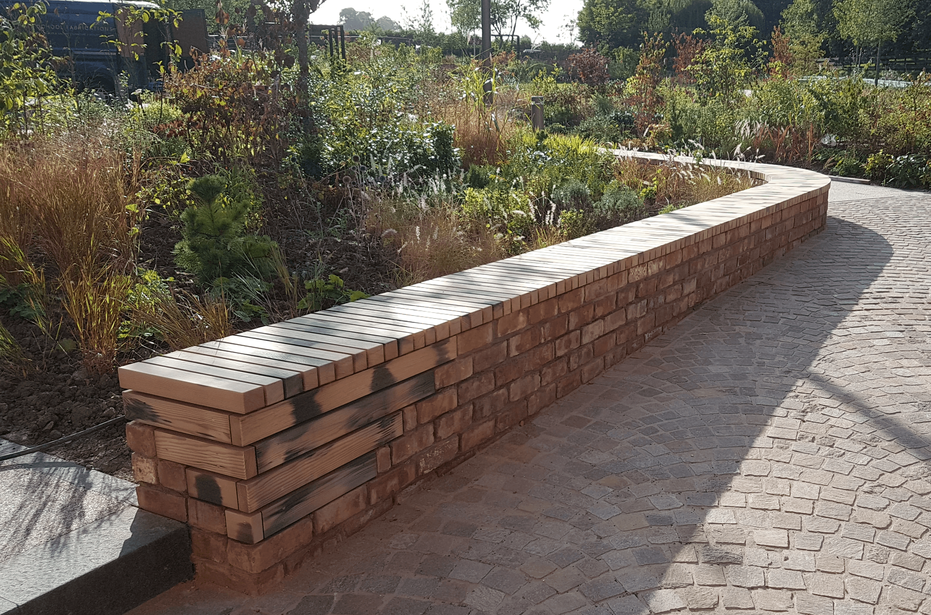 Outdoor furniture made from reclaimed natural timber material in collaboration with landscape architects